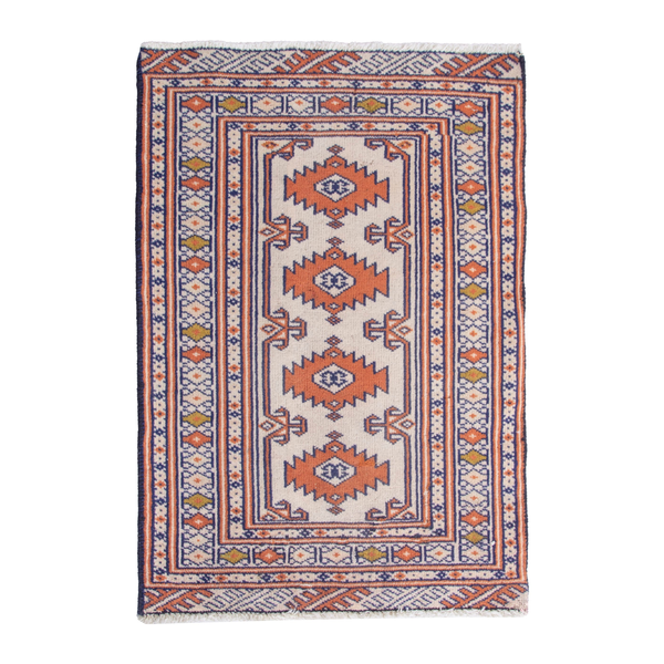 Persian Torkaman accent rug in cream and rust, 2' x 2'10"