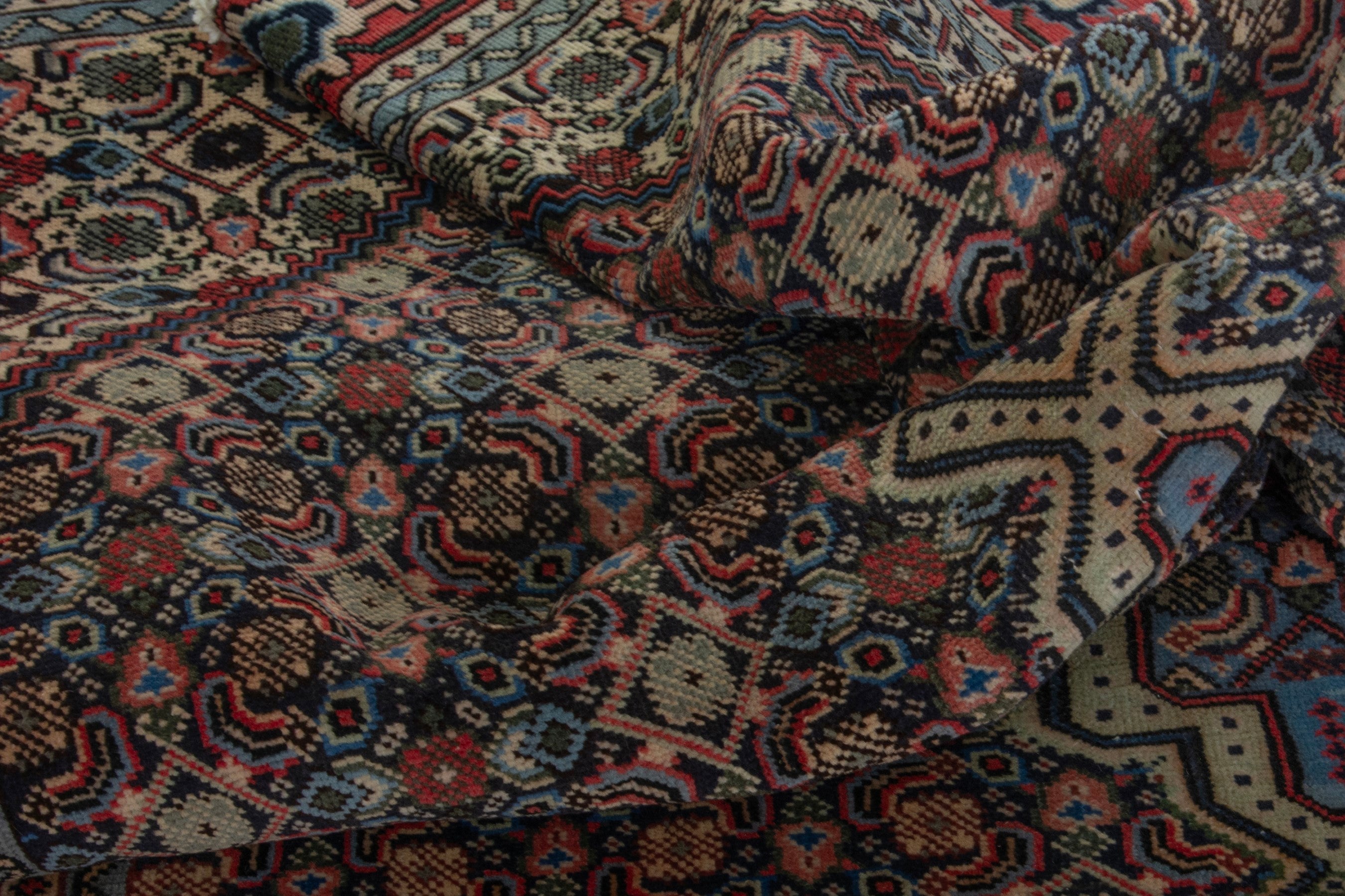 Persian Ardabil area rug in navy and burgundy, view 15 of 16