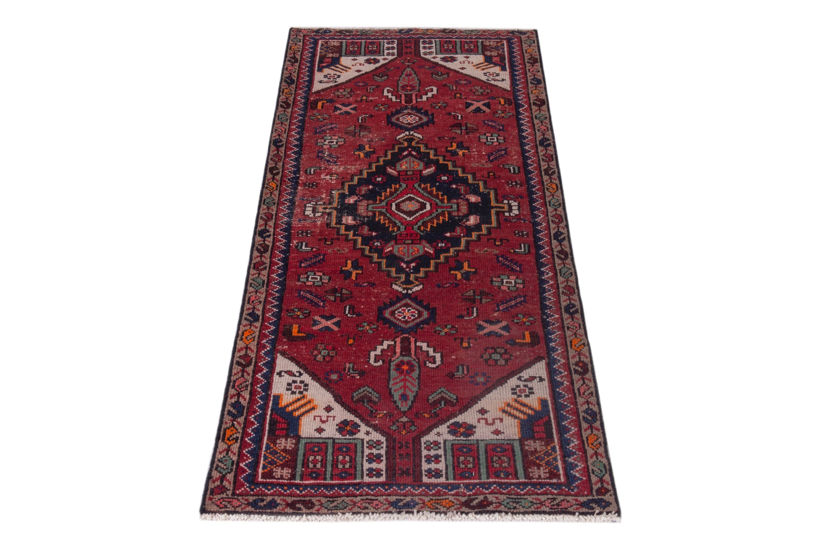 Persian Zanjan runner rug in deep red and navy, view 2 of 19