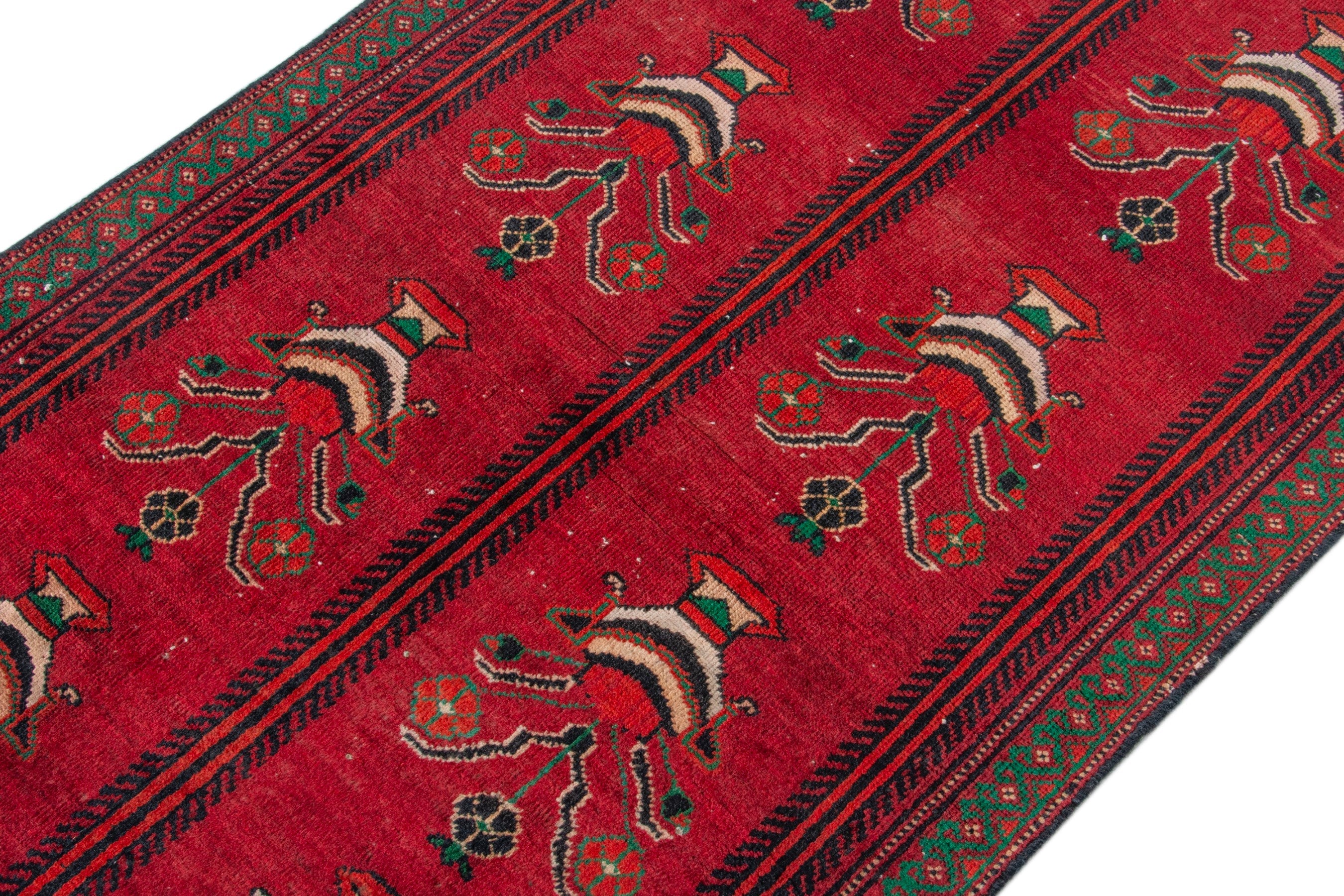 Persian Baluch accent rug in deep red and dark brown, view 4 of 16