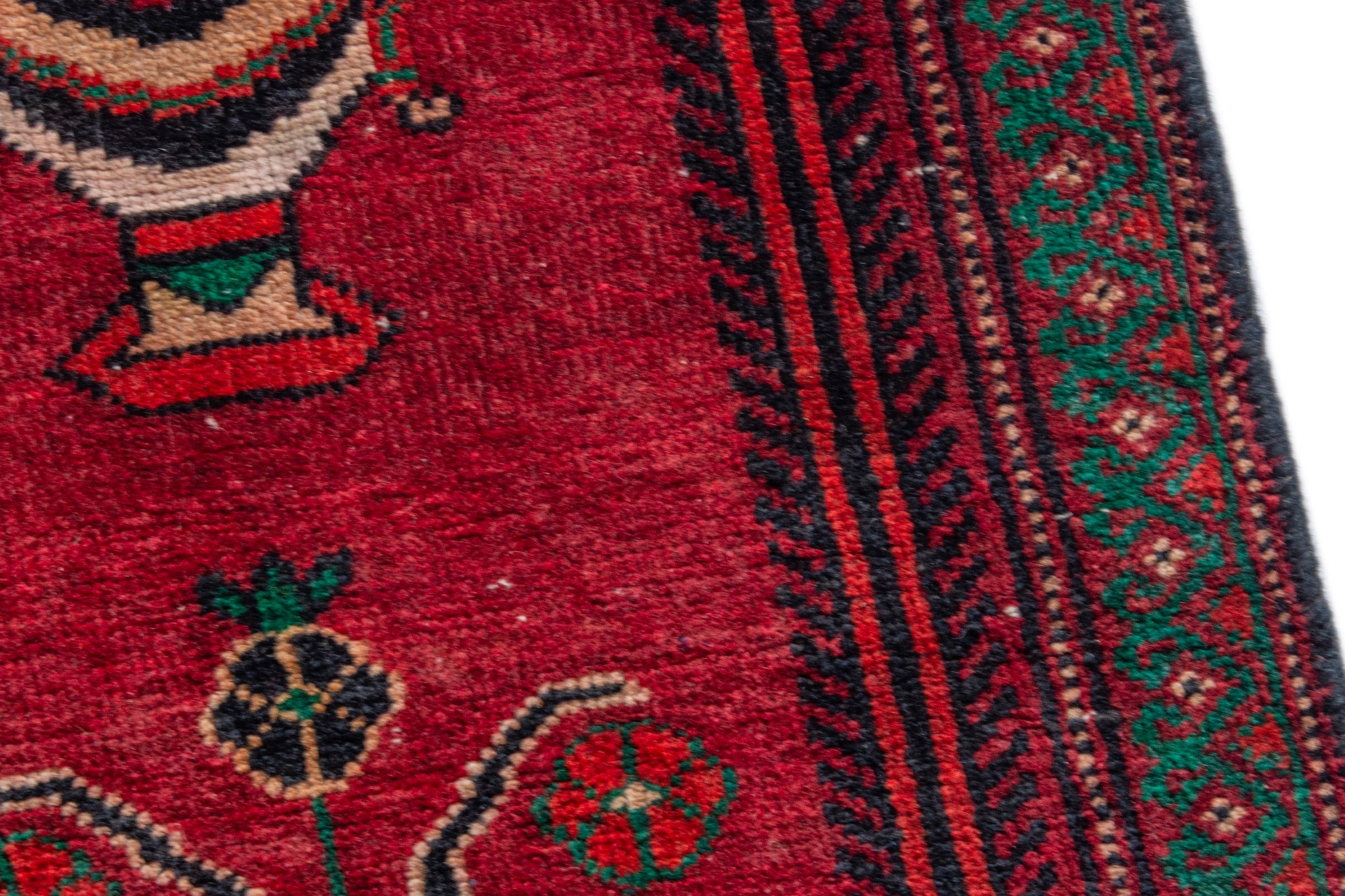 Persian Baluch accent rug in deep red and dark brown, view 7 of 16