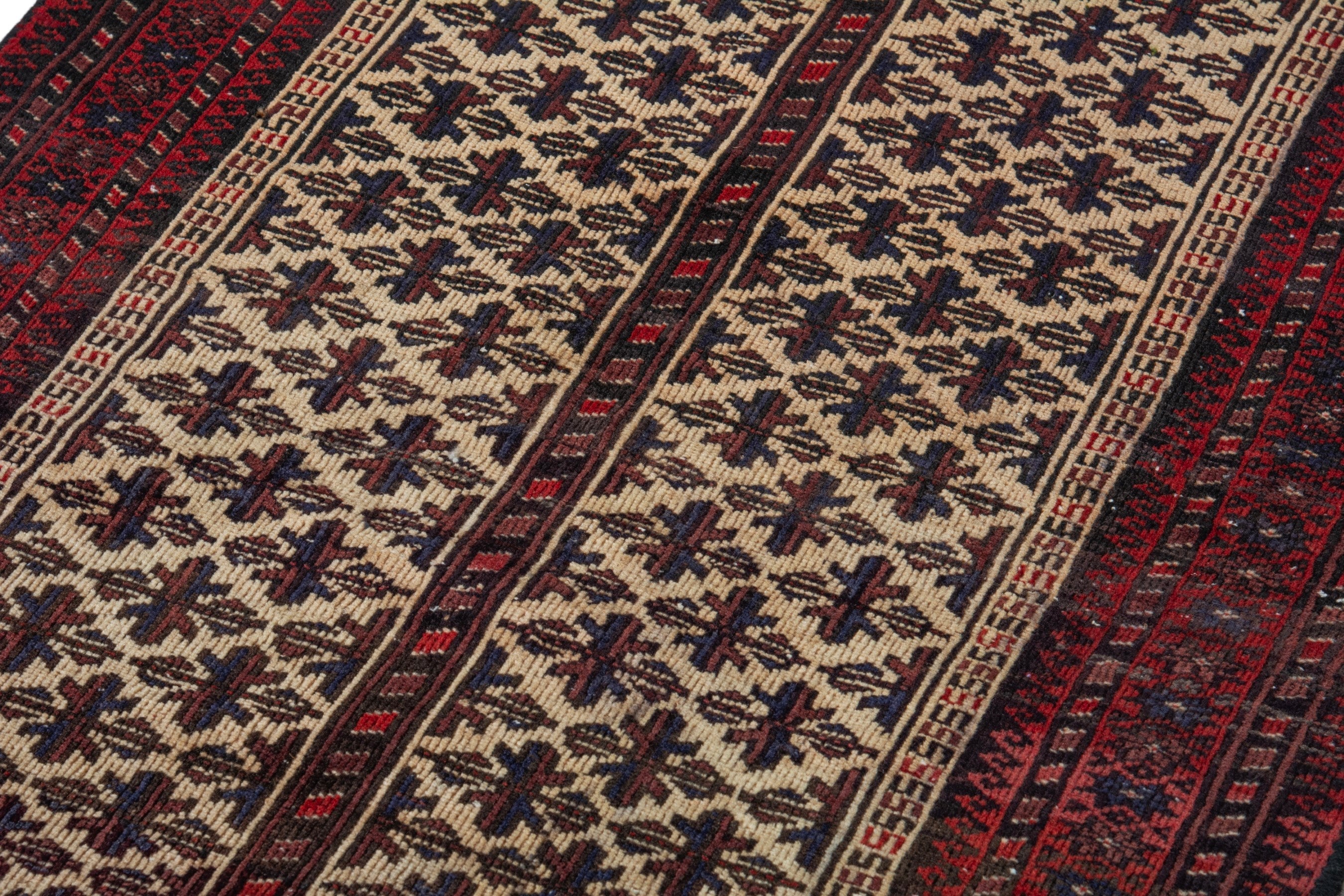 Persian Baluch accent rug in cream and burgundy, view 9 of 16