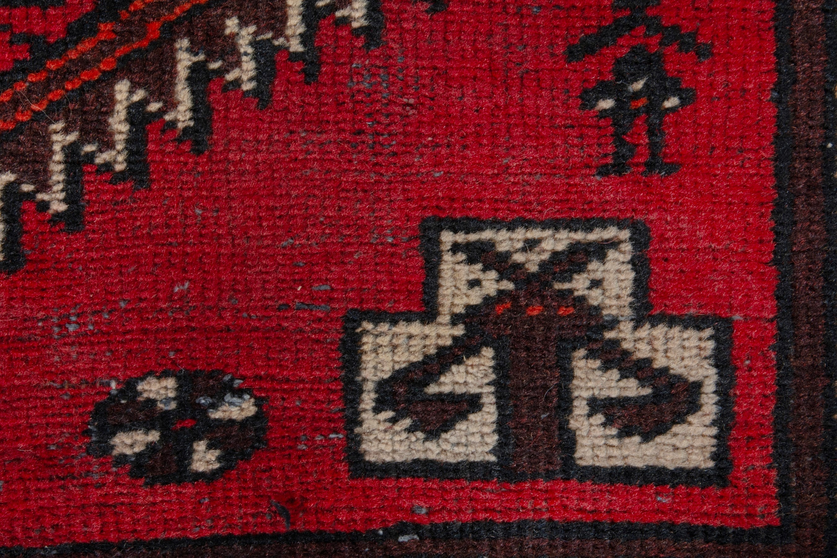 Persian Baluch accent rug in deep red and burgundy, view 10 of 17