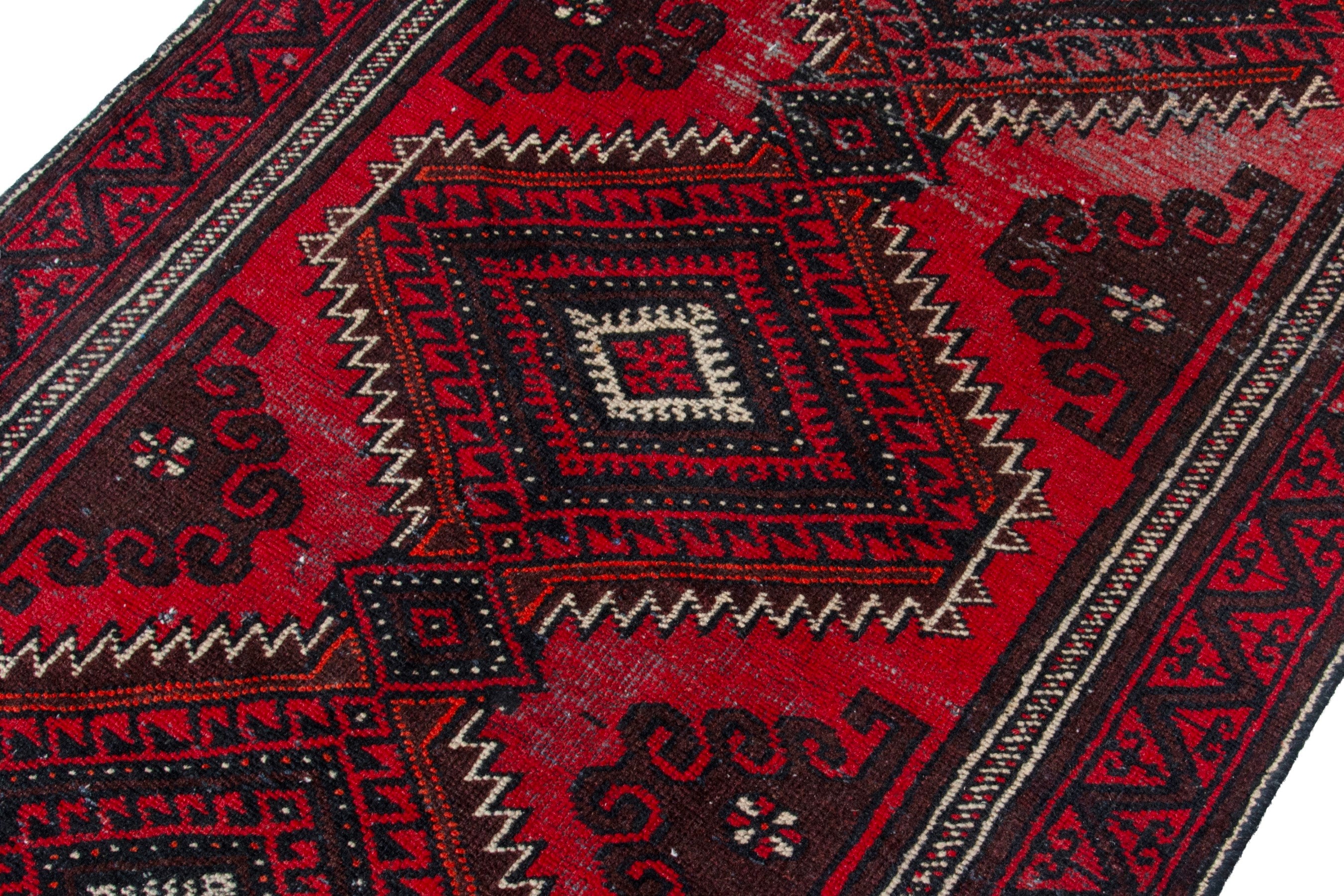 Persian Baluch accent rug in deep red and burgundy, view 4 of 17