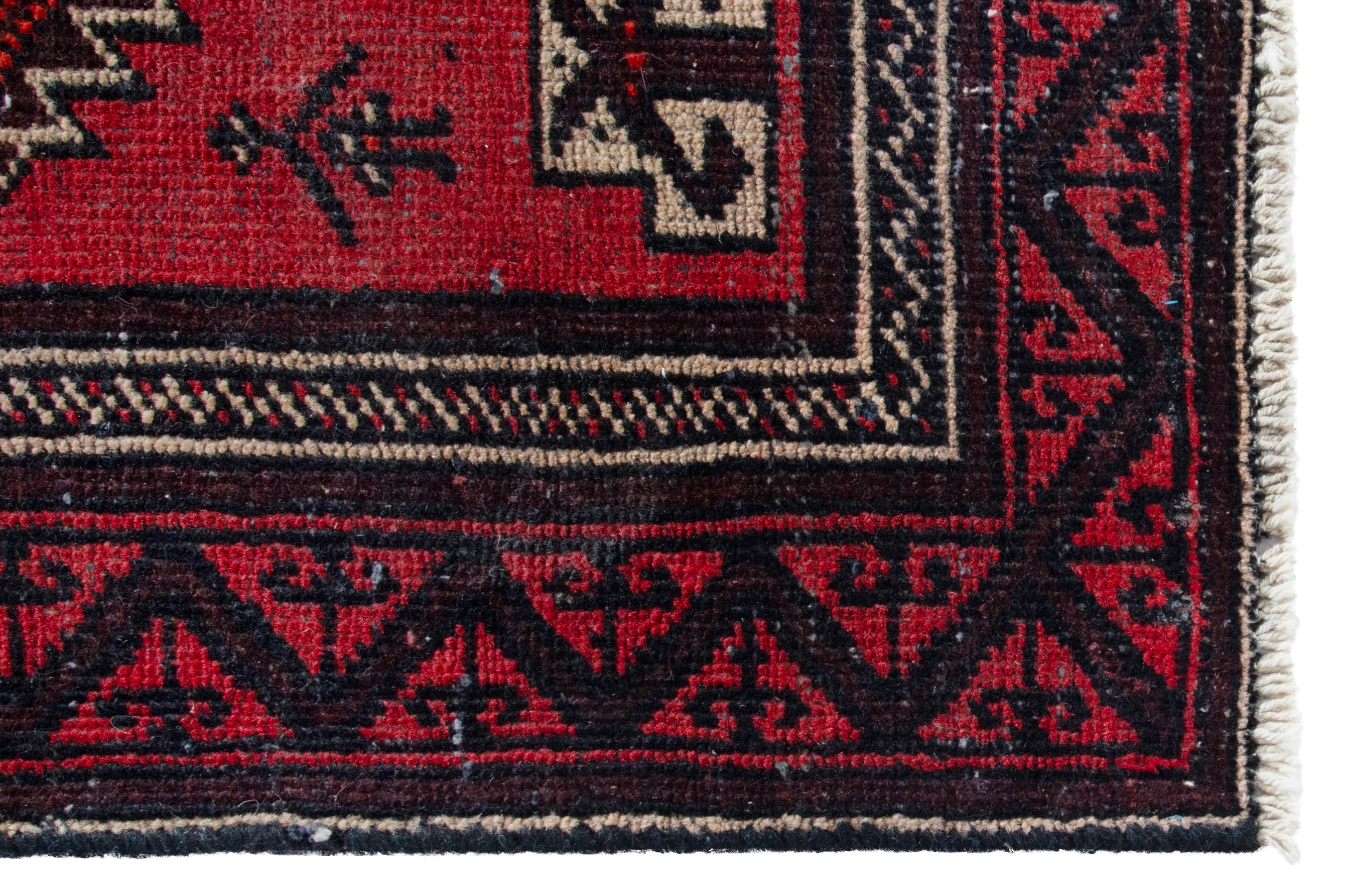 Persian Baluch accent rug in deep red and burgundy, view 5 of 17