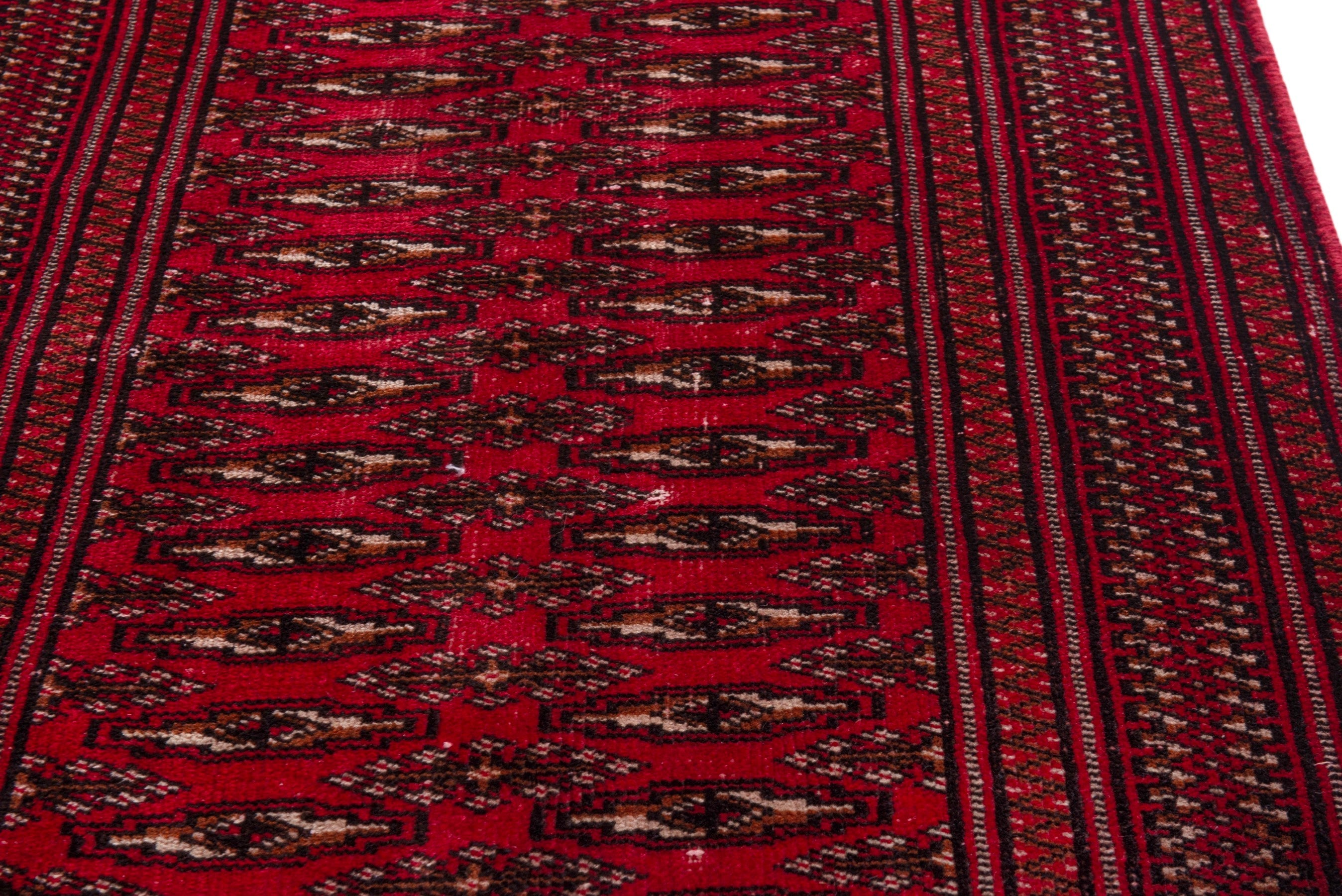 Persian Torkaman accent rug in burgundy and deep red, view 10 of 17