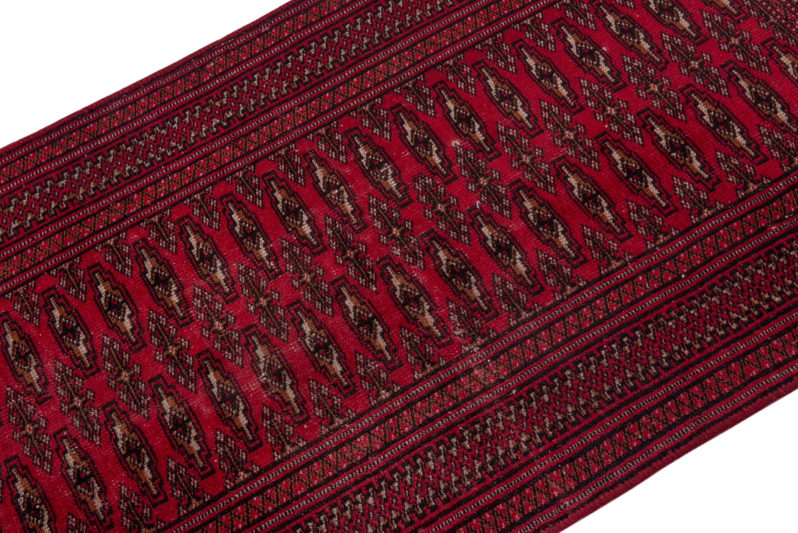 Persian Torkaman accent rug in burgundy and deep red, view 4 of 17