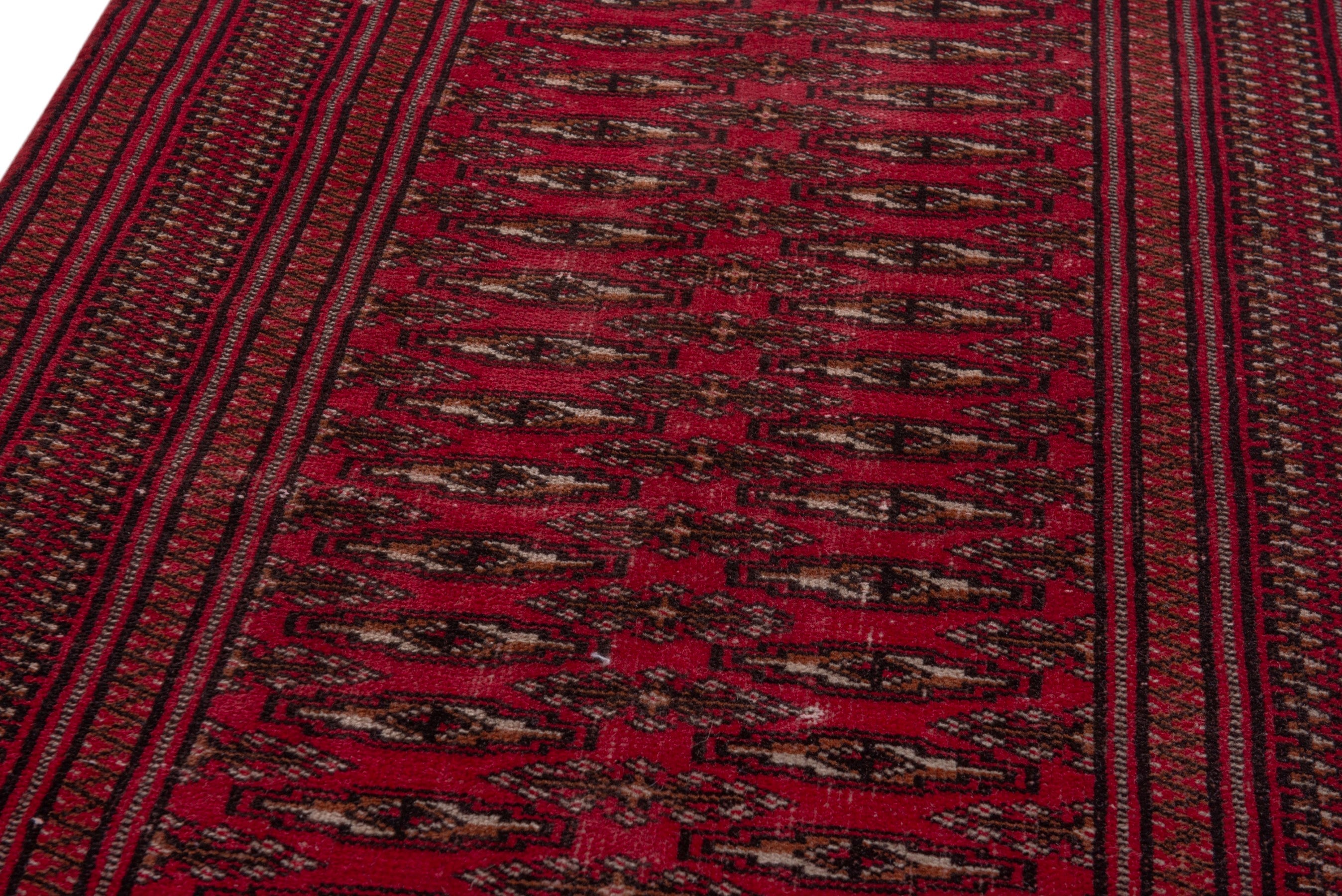 Persian Torkaman accent rug in burgundy and deep red, view 9 of 17