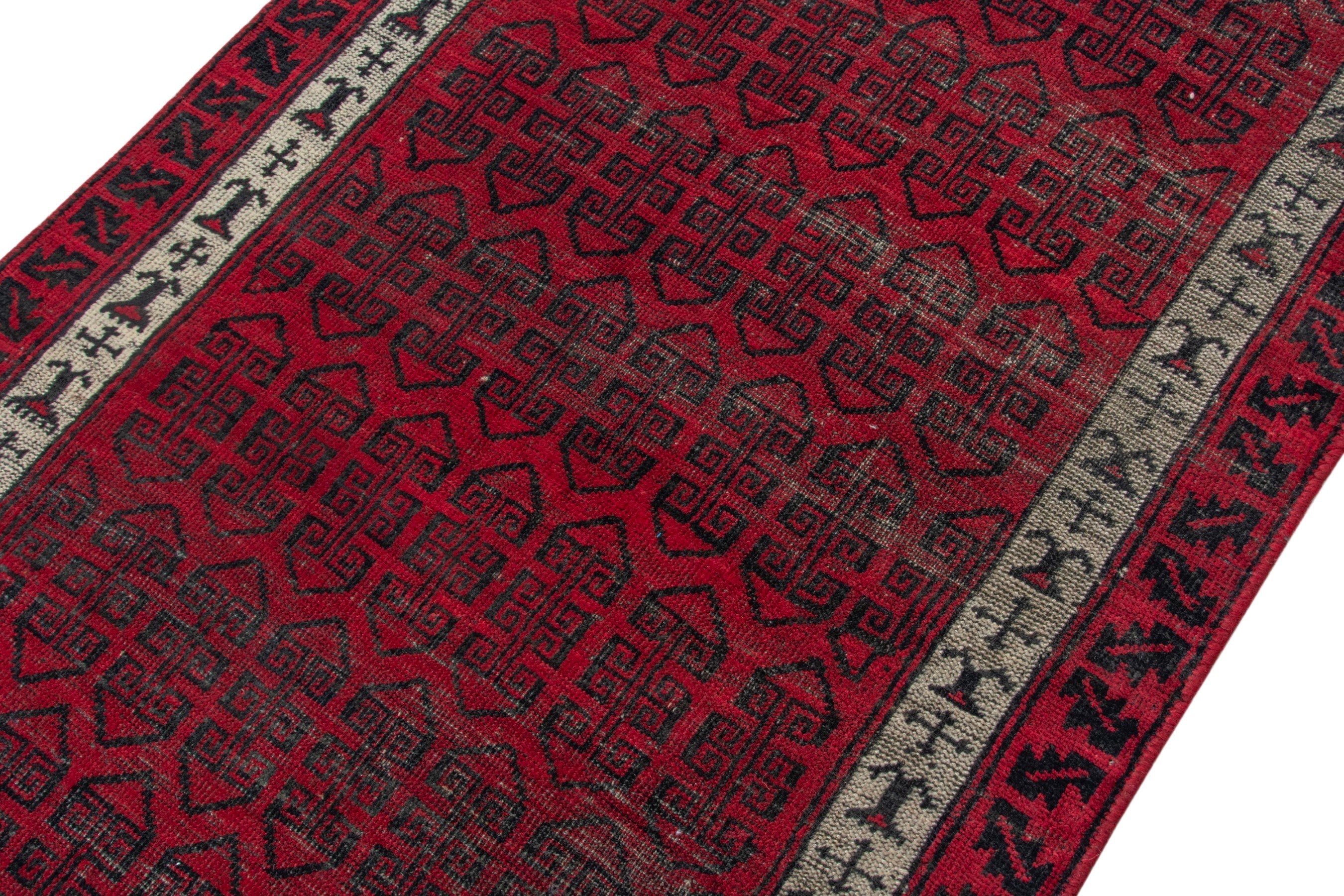 Persian Baluch accent rug in deep red and burgundy, view 4 of 16
