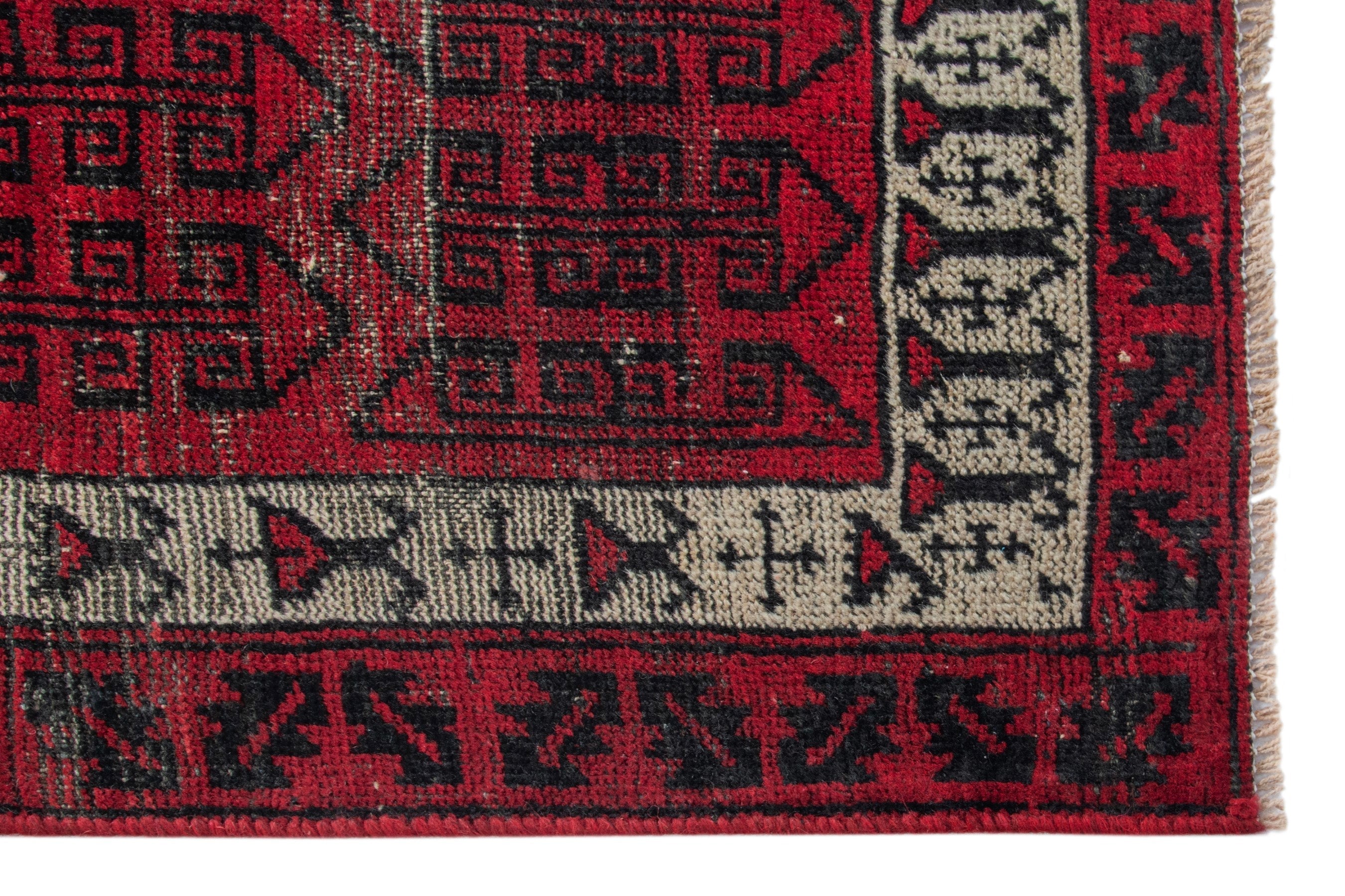 Persian Baluch accent rug in deep red and burgundy, view 5 of 16