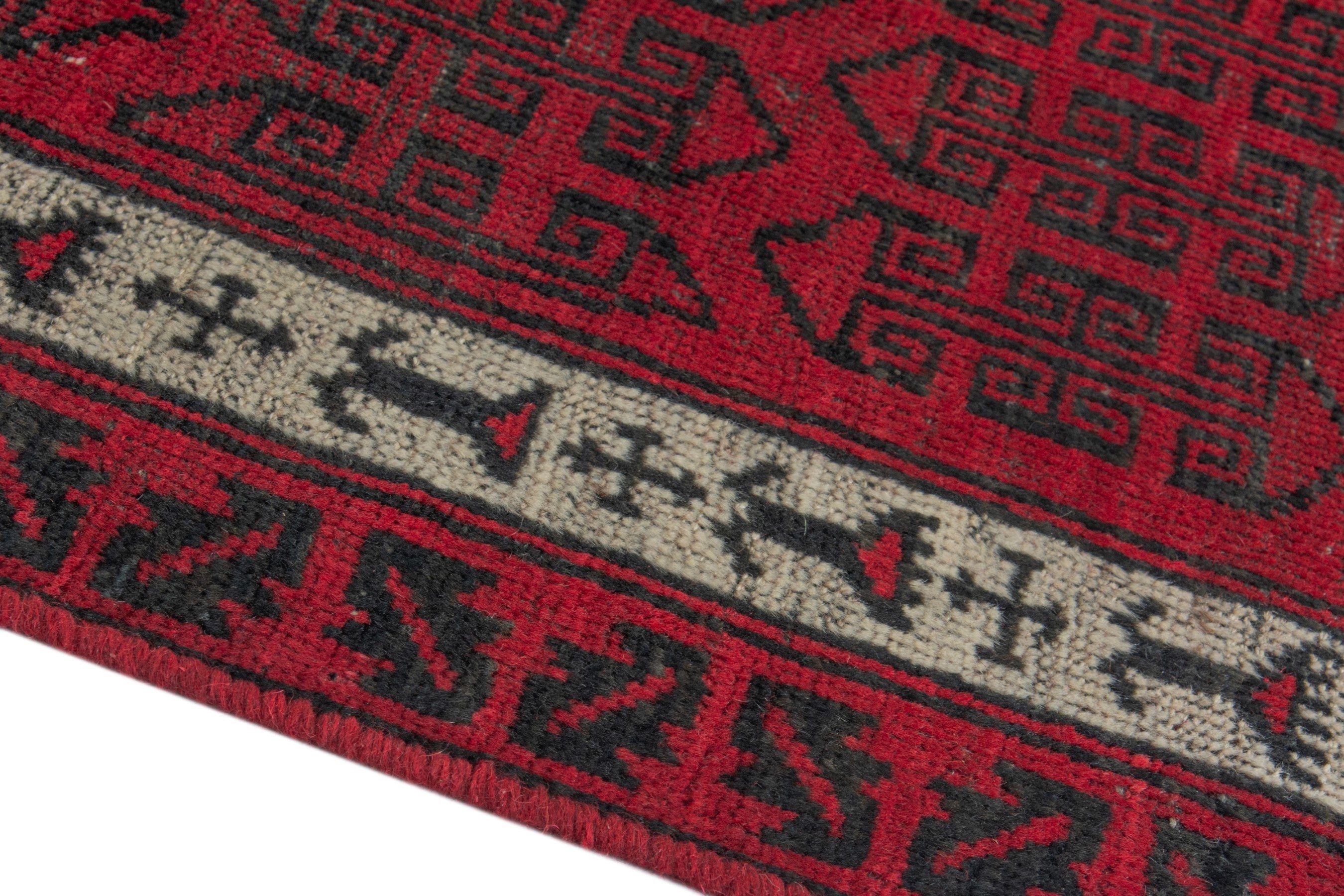 Persian Baluch accent rug in deep red and burgundy, view 8 of 16