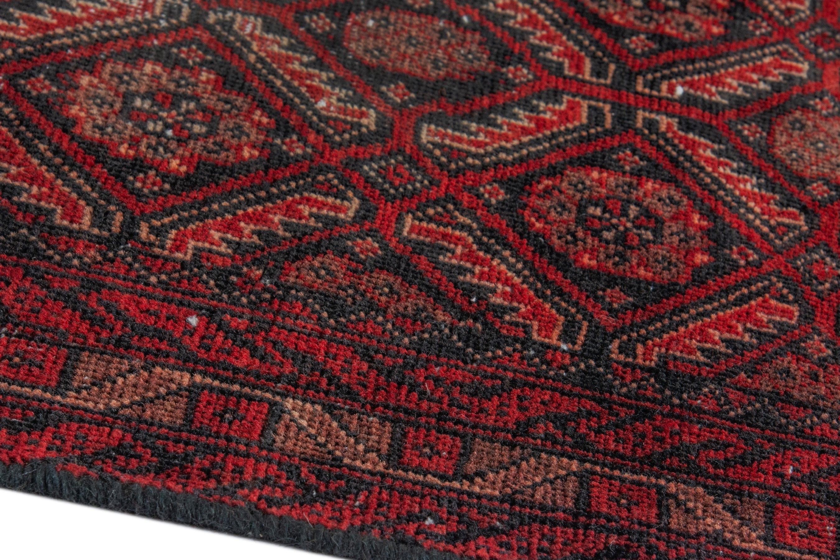 Persian Baluch accent rug in burgundy and deep red, view 8 of 16