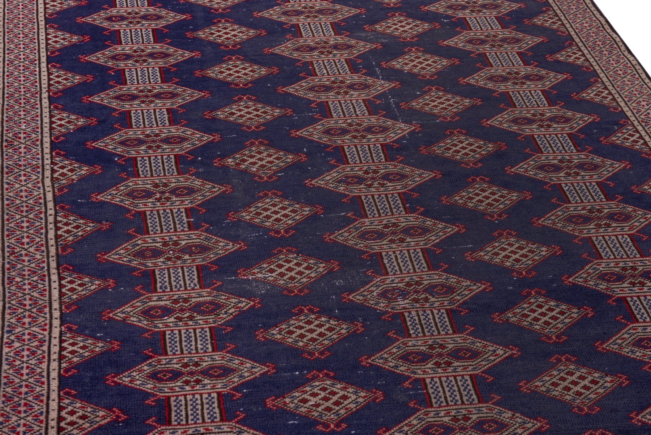 Persian Torkaman accent rug in navy and tan, view 10 of 17