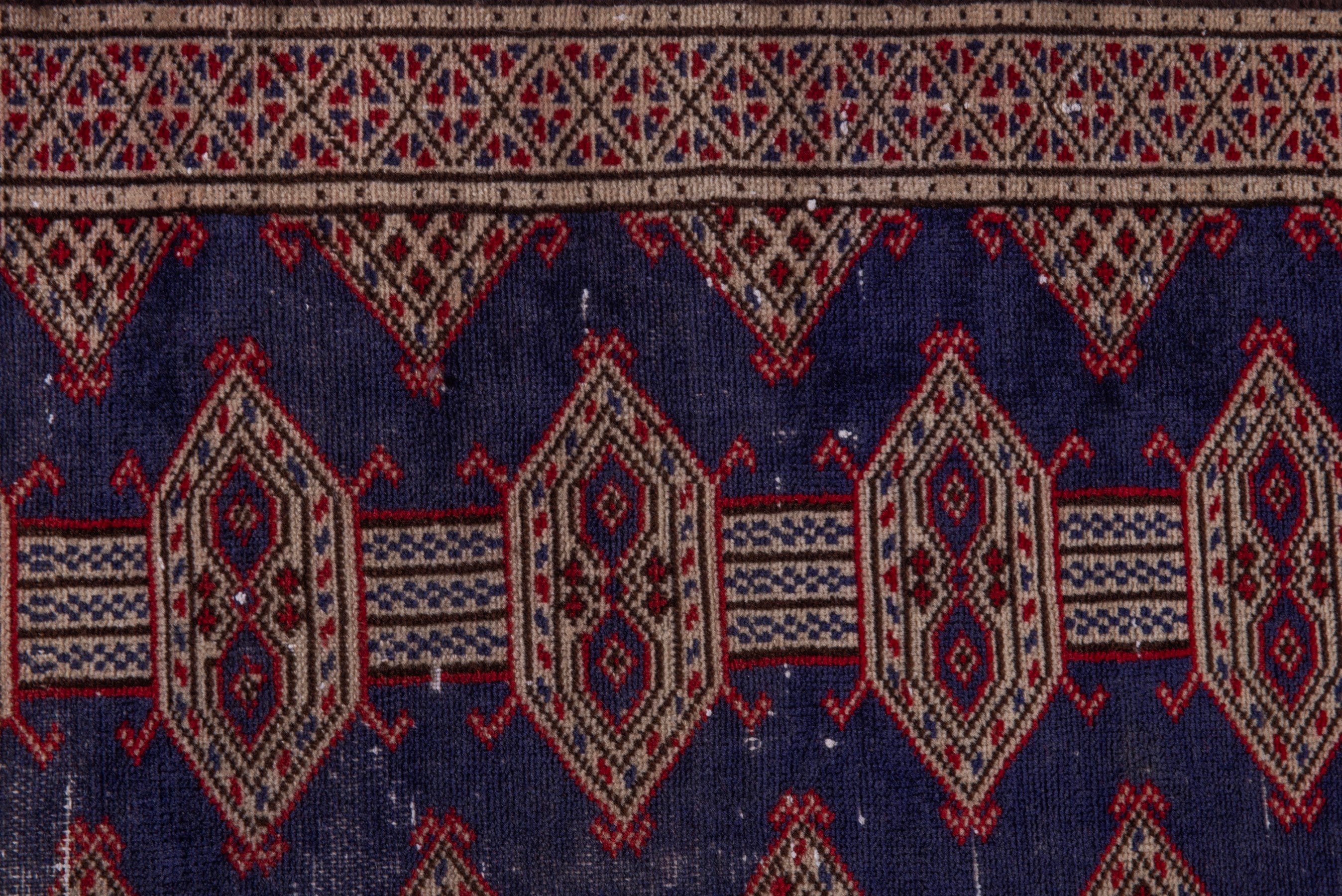 Persian Torkaman accent rug in navy and tan, view 12 of 17