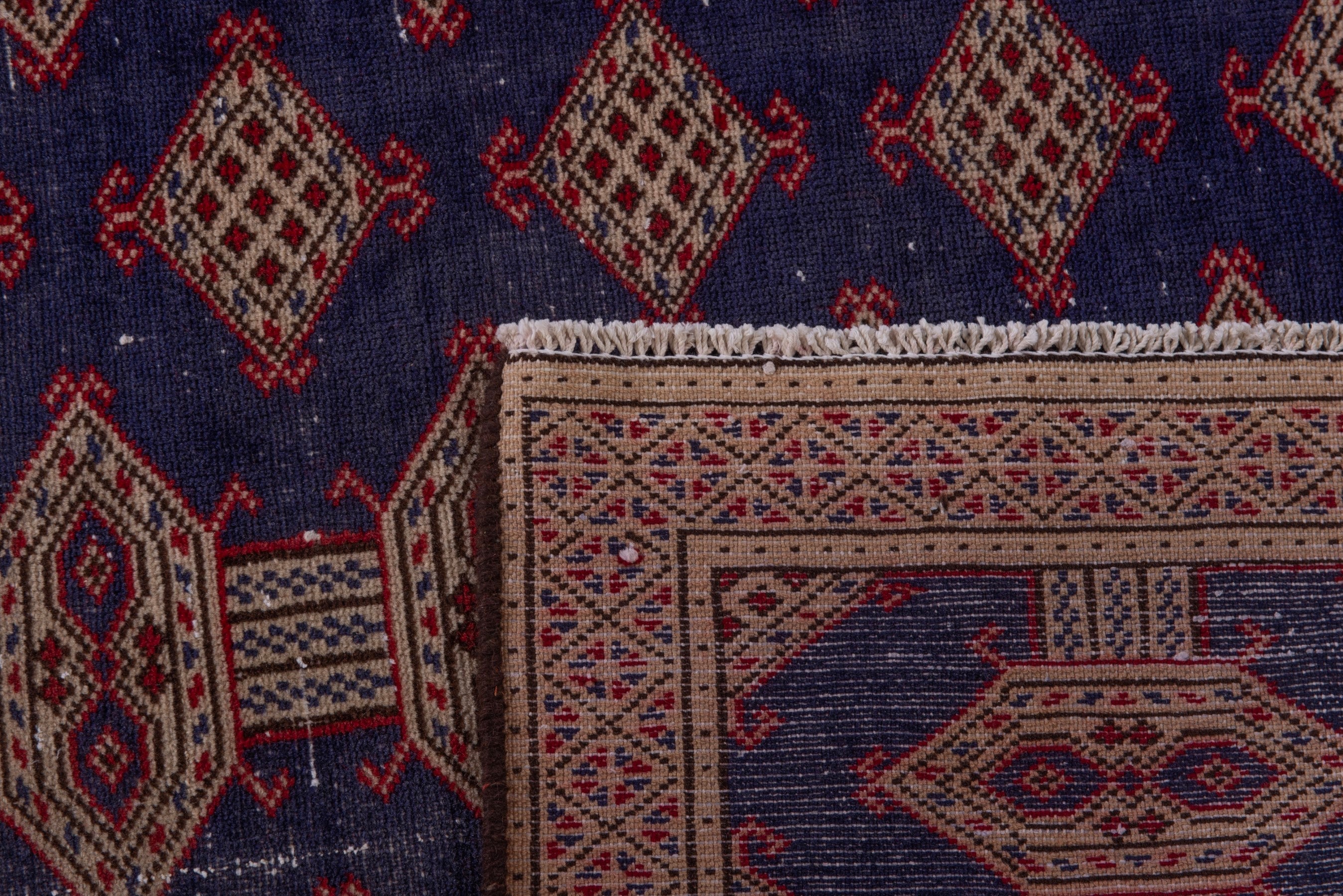 Persian Torkaman accent rug in navy and tan, view 17 of 17