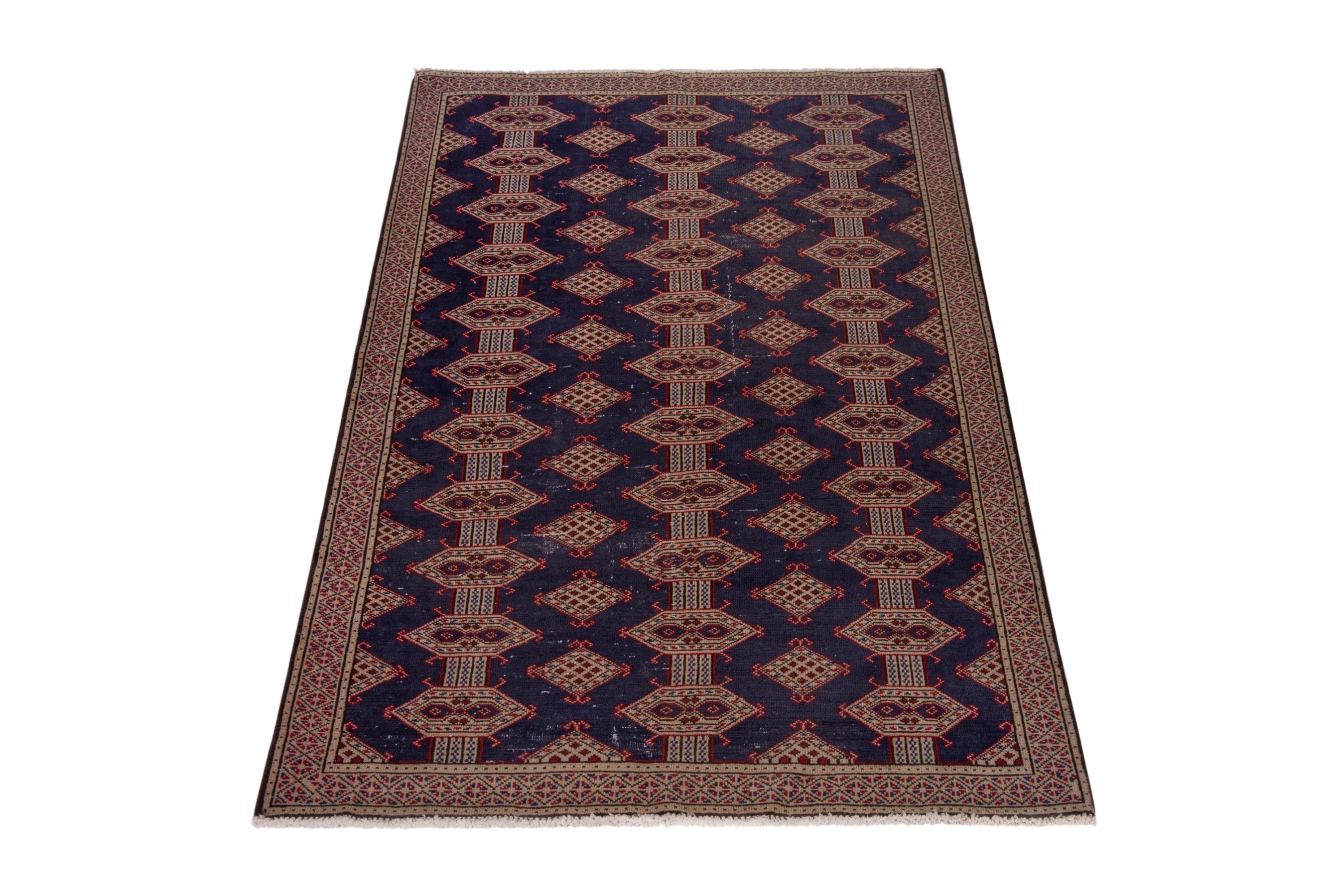 Persian Torkaman accent rug in navy and tan, view 3 of 17