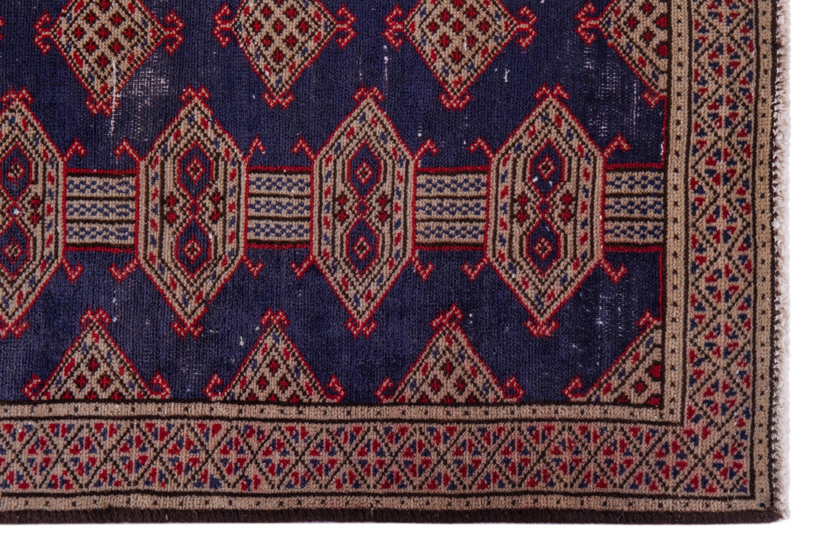 Persian Torkaman accent rug in navy and tan, view 5 of 17