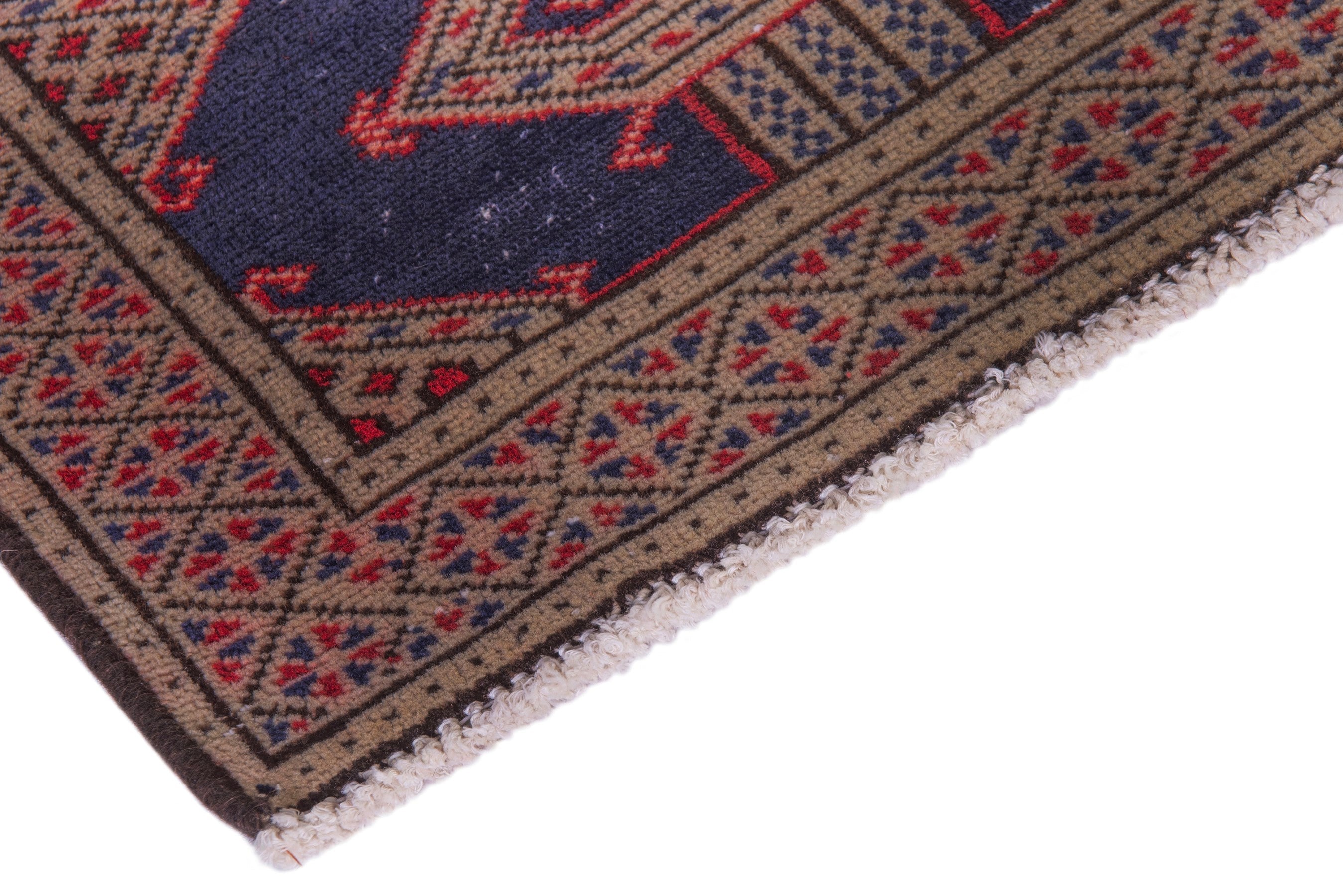 Persian Torkaman accent rug in navy and tan, view 6 of 17