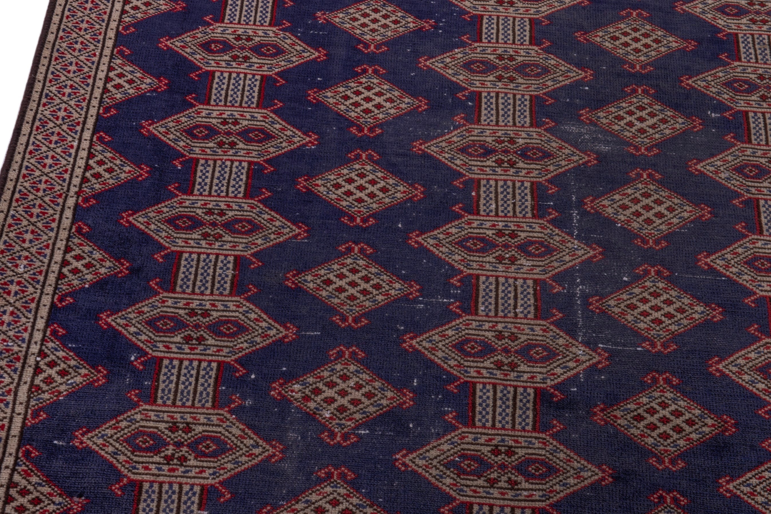 Persian Torkaman accent rug in navy and tan, view 7 of 17