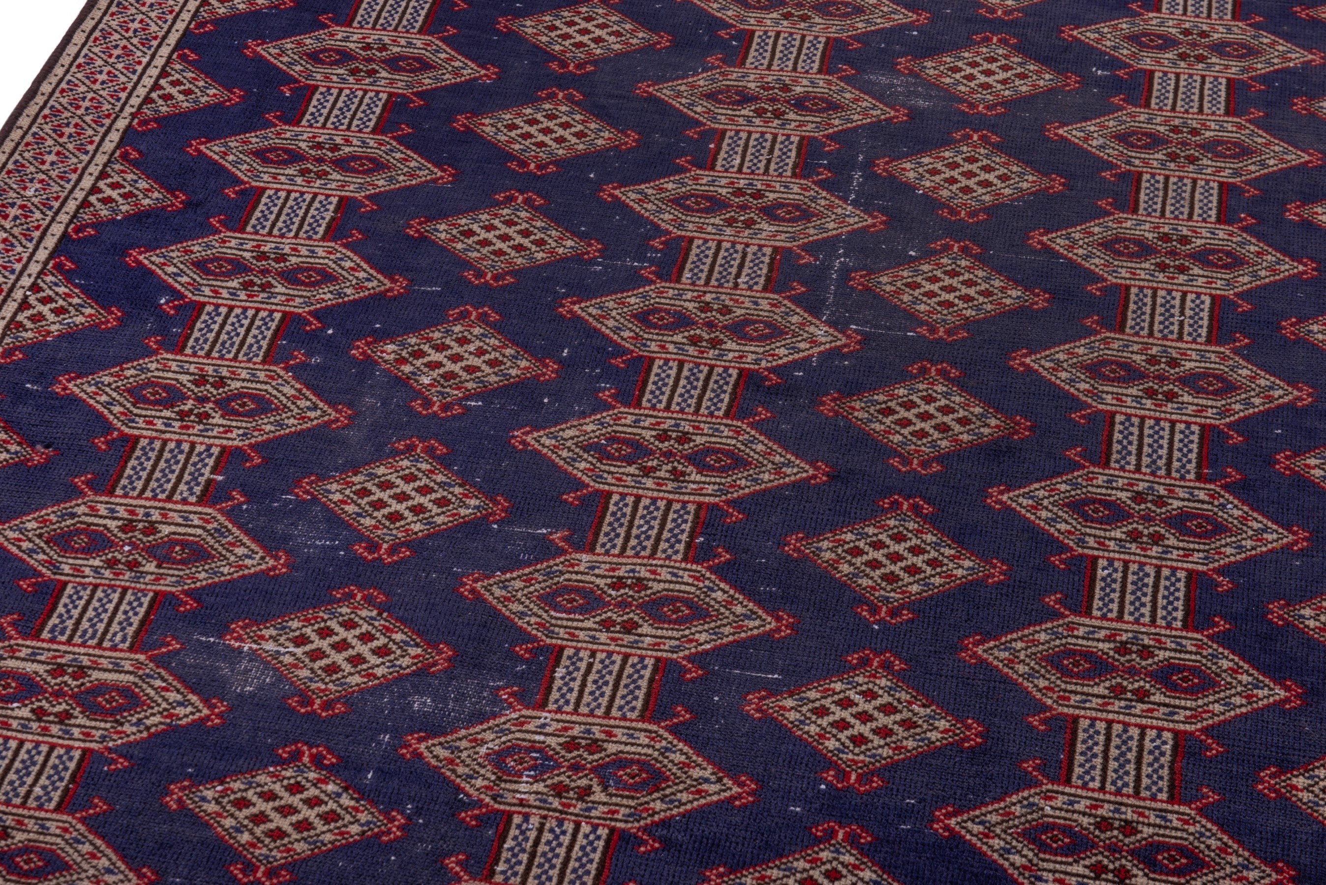 Persian Torkaman accent rug in navy and tan, view 9 of 17
