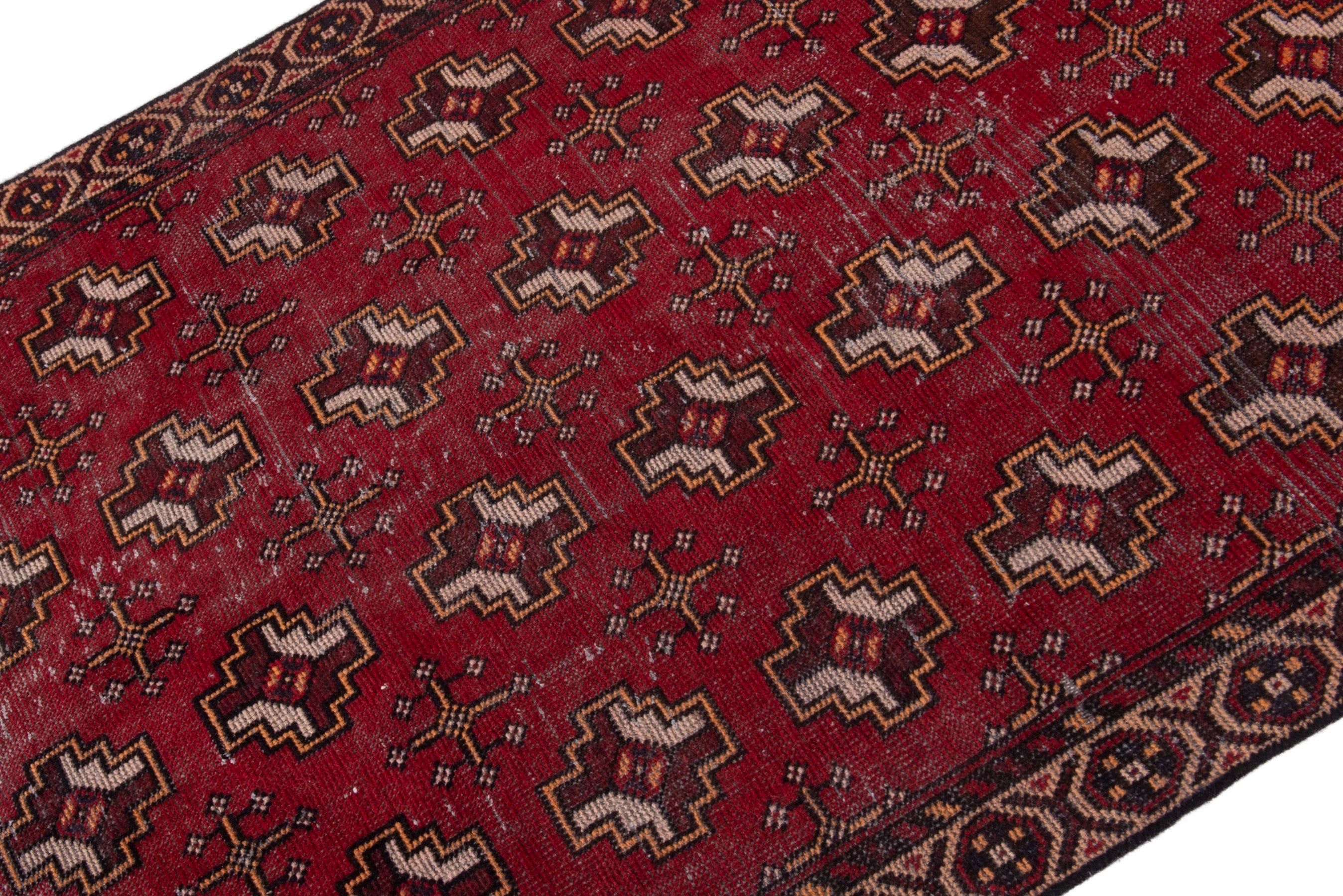 Persian Torkaman accent rug in deep red and tan, view 4 of 18