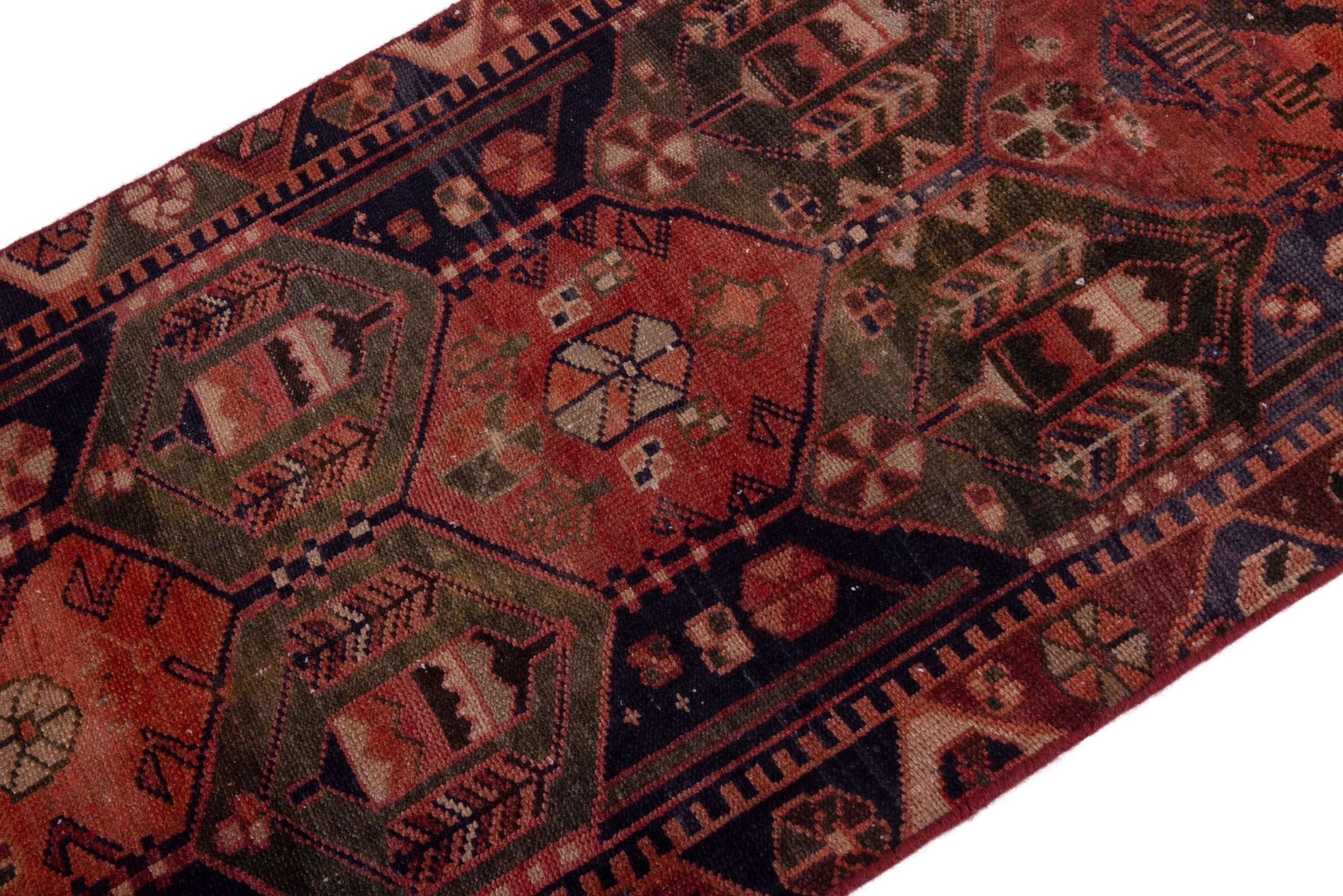 Persian Bakhtiari accent rug in navy and rust, view 4 of 18