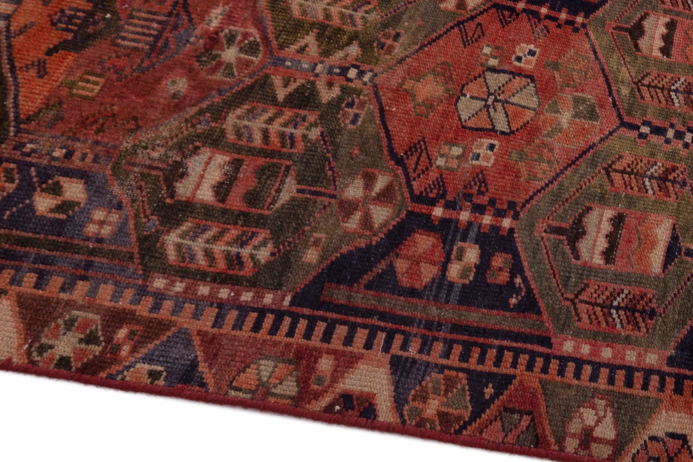 Persian Bakhtiari accent rug in navy and rust, view 8 of 18