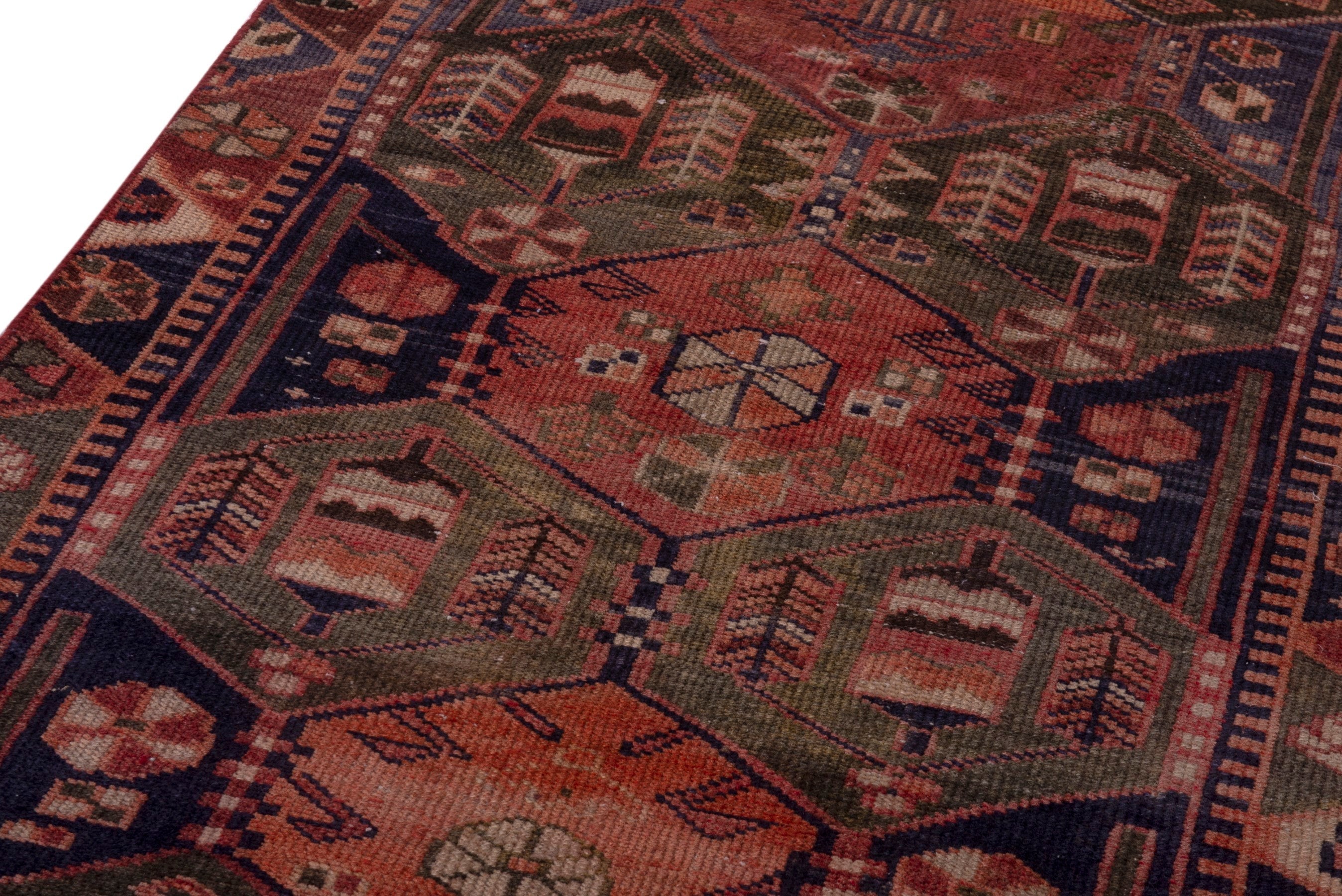 Persian Bakhtiari accent rug in navy and rust, view 9 of 18