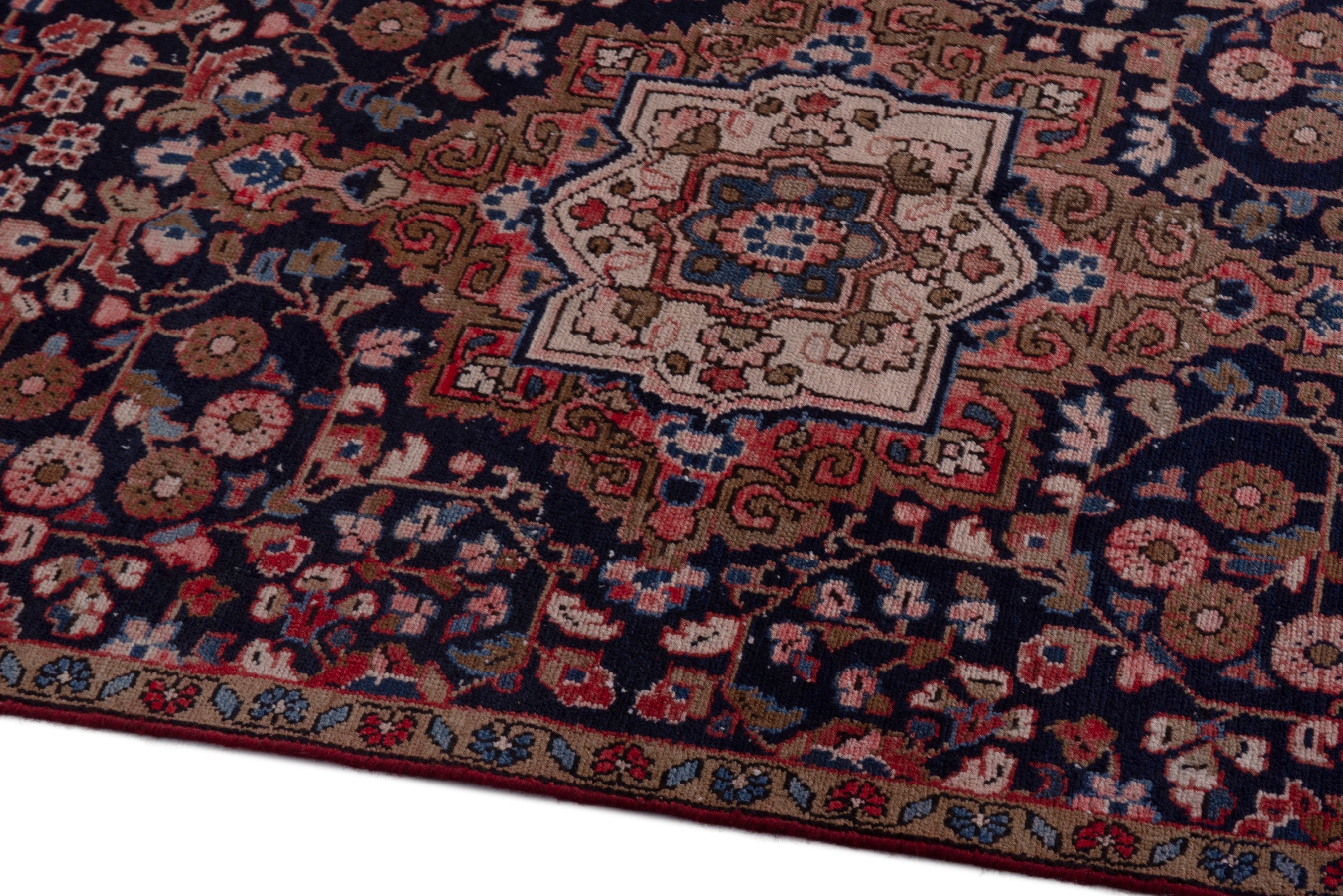 Persian Hamedan accent rug in navy and rust, view 8 of 17
