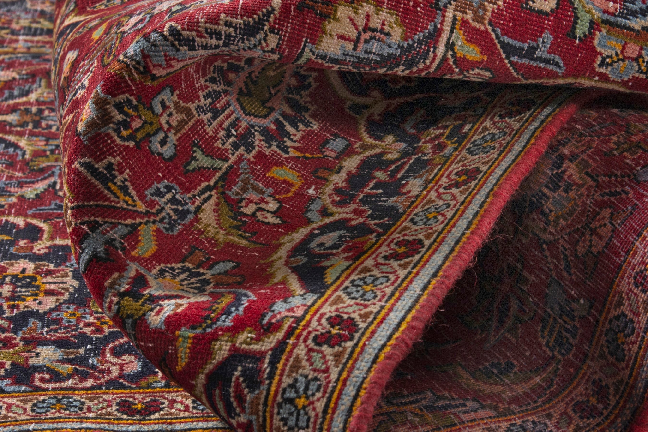 Persian Kashan accent rug in deep red and navy, view 14 of 17