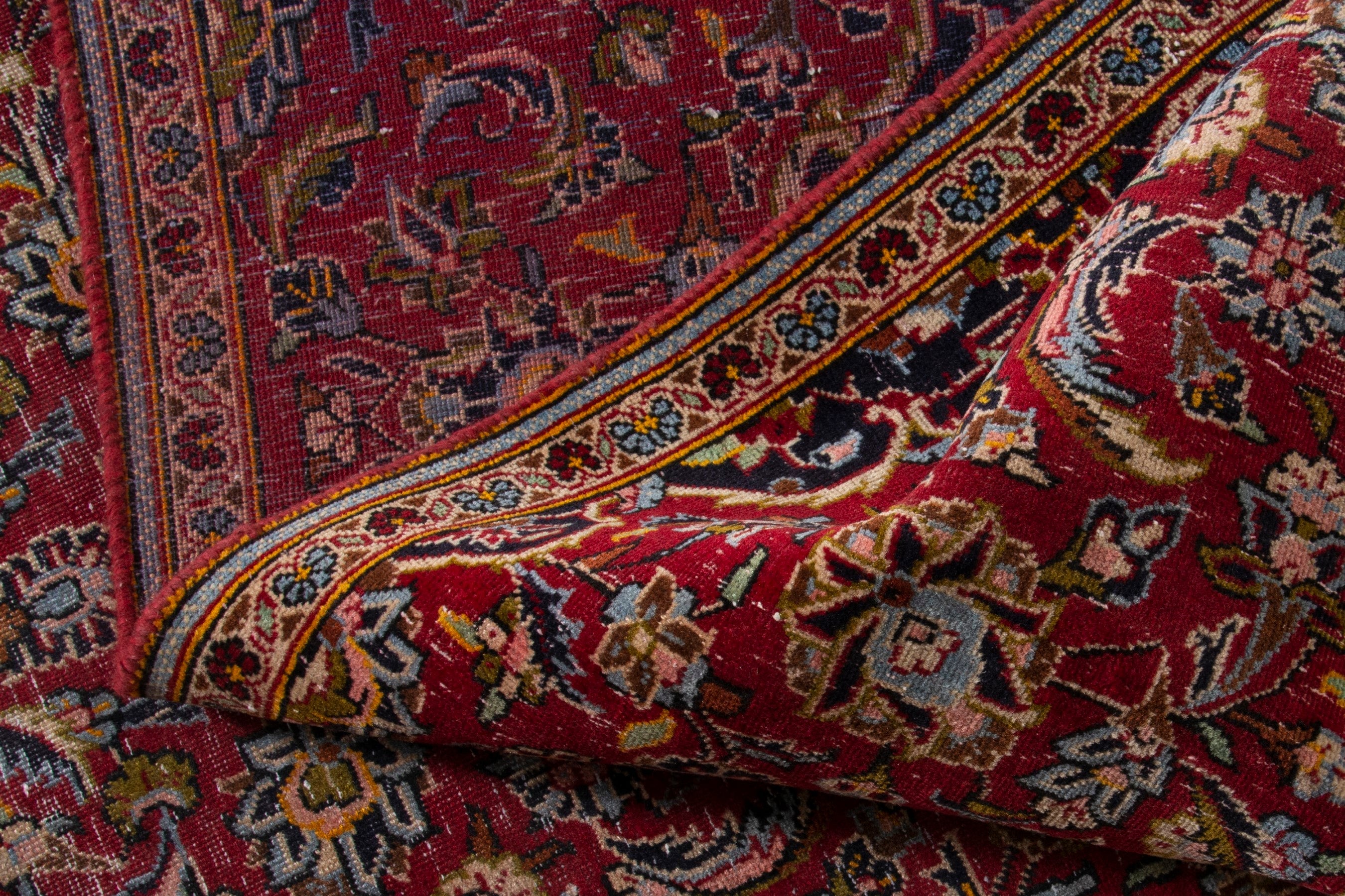 Persian Kashan accent rug in deep red and navy, view 16 of 17