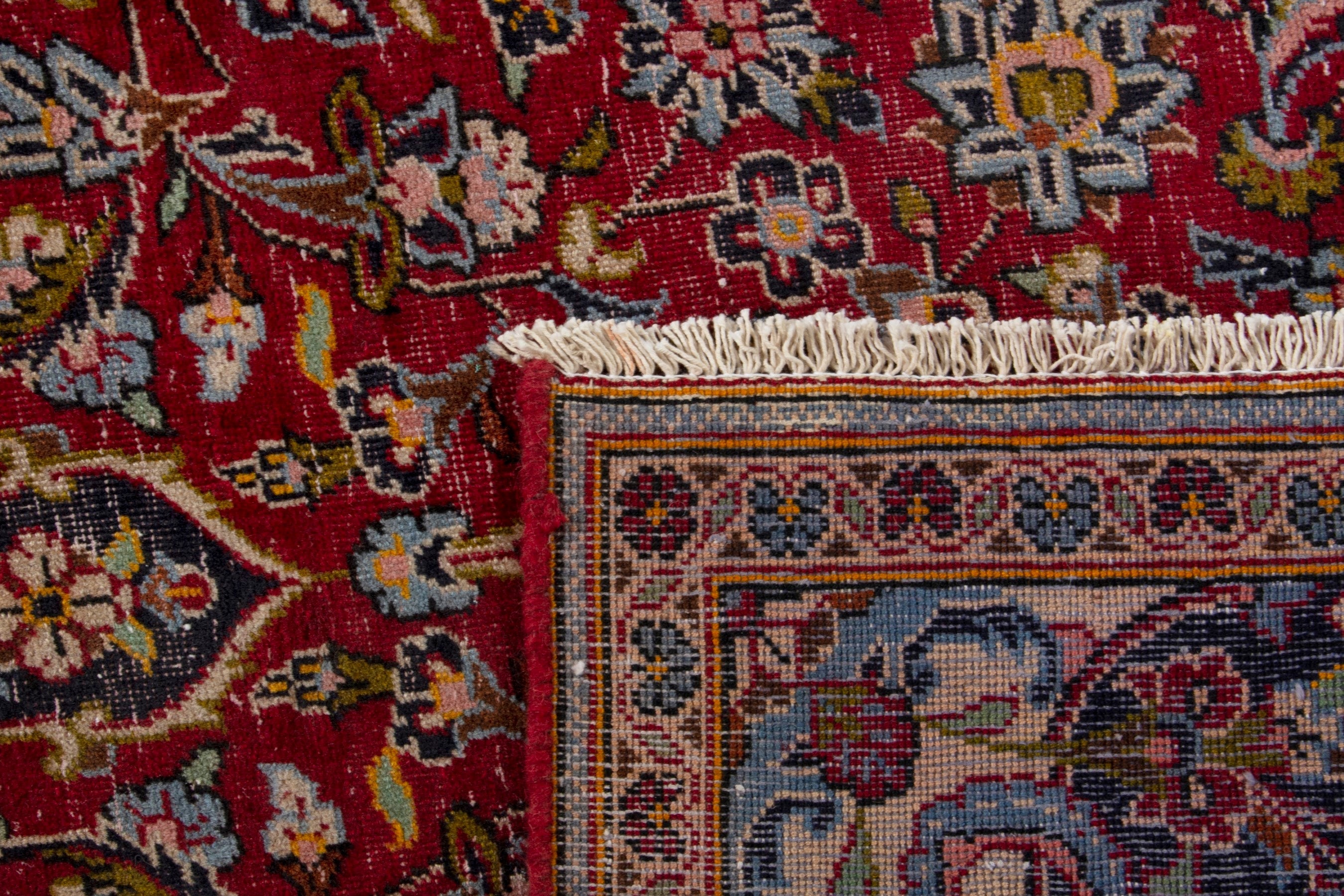Persian Kashan accent rug in deep red and navy, view 17 of 17