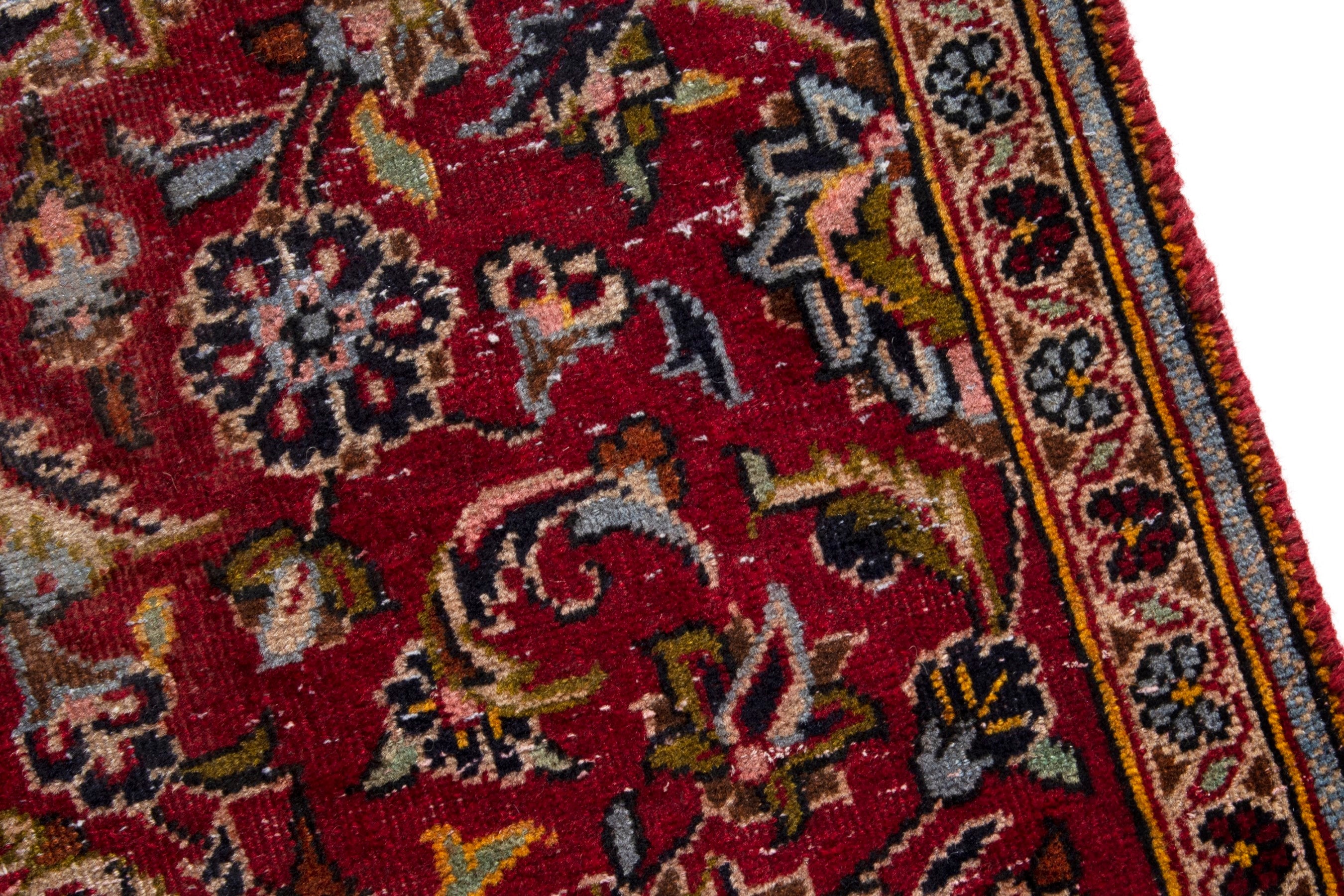 Persian Kashan accent rug in deep red and navy, view 7 of 17