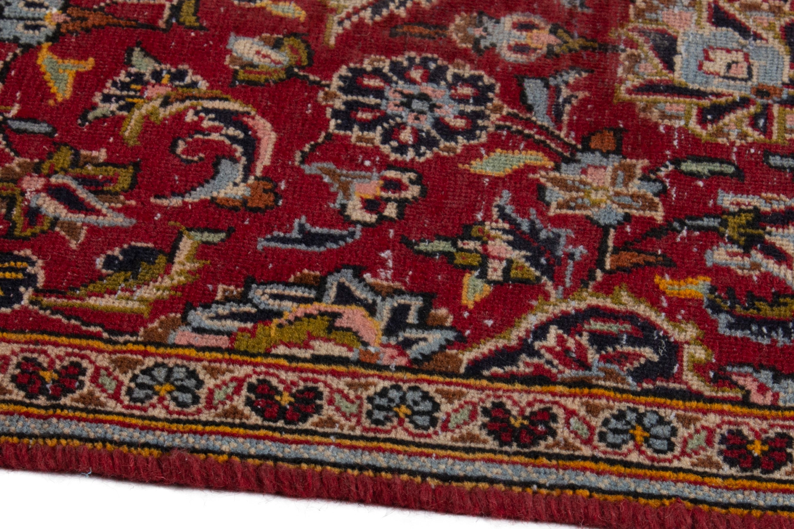 Persian Kashan accent rug in deep red and navy, view 8 of 17