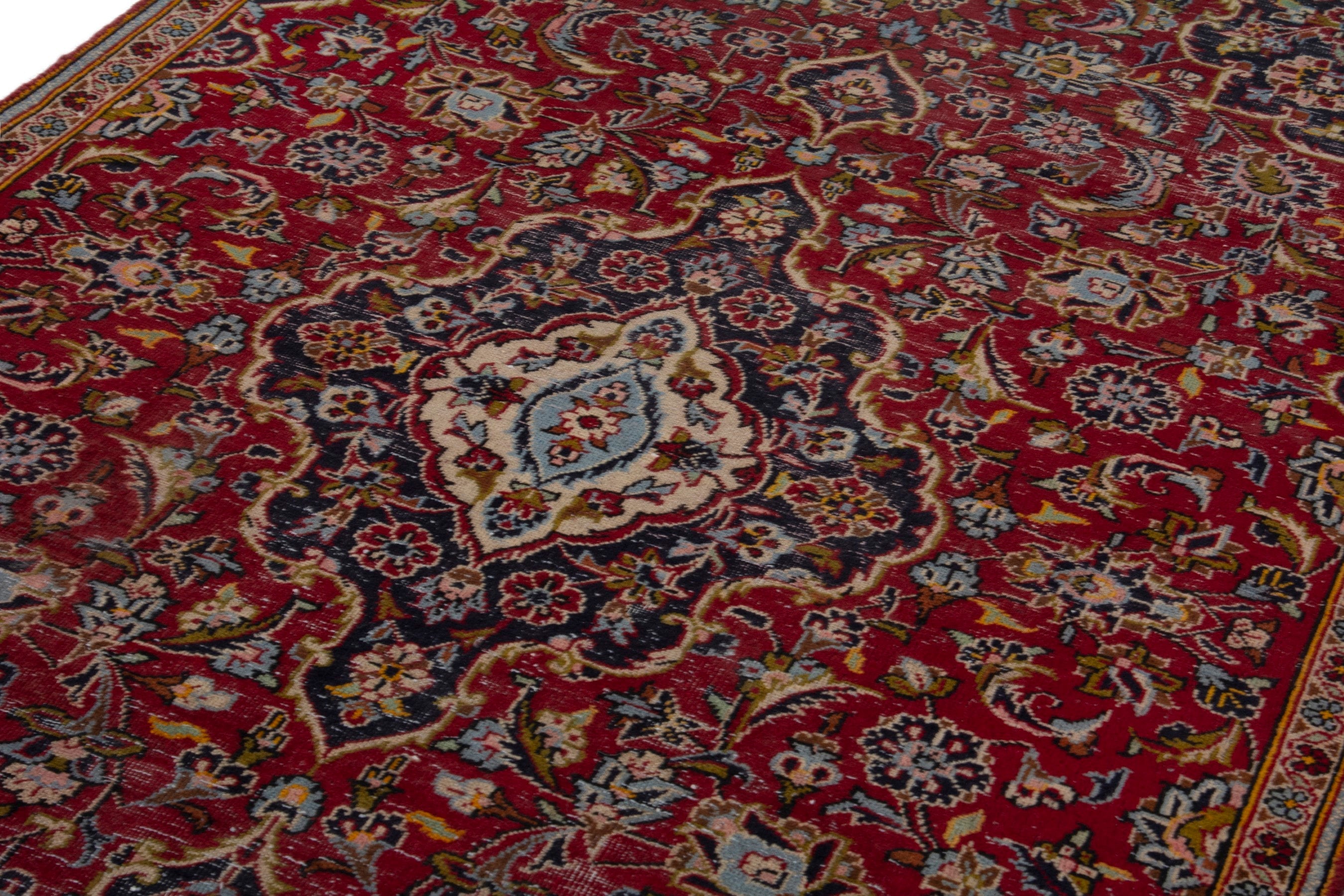 Persian Kashan accent rug in deep red and navy, view 9 of 17