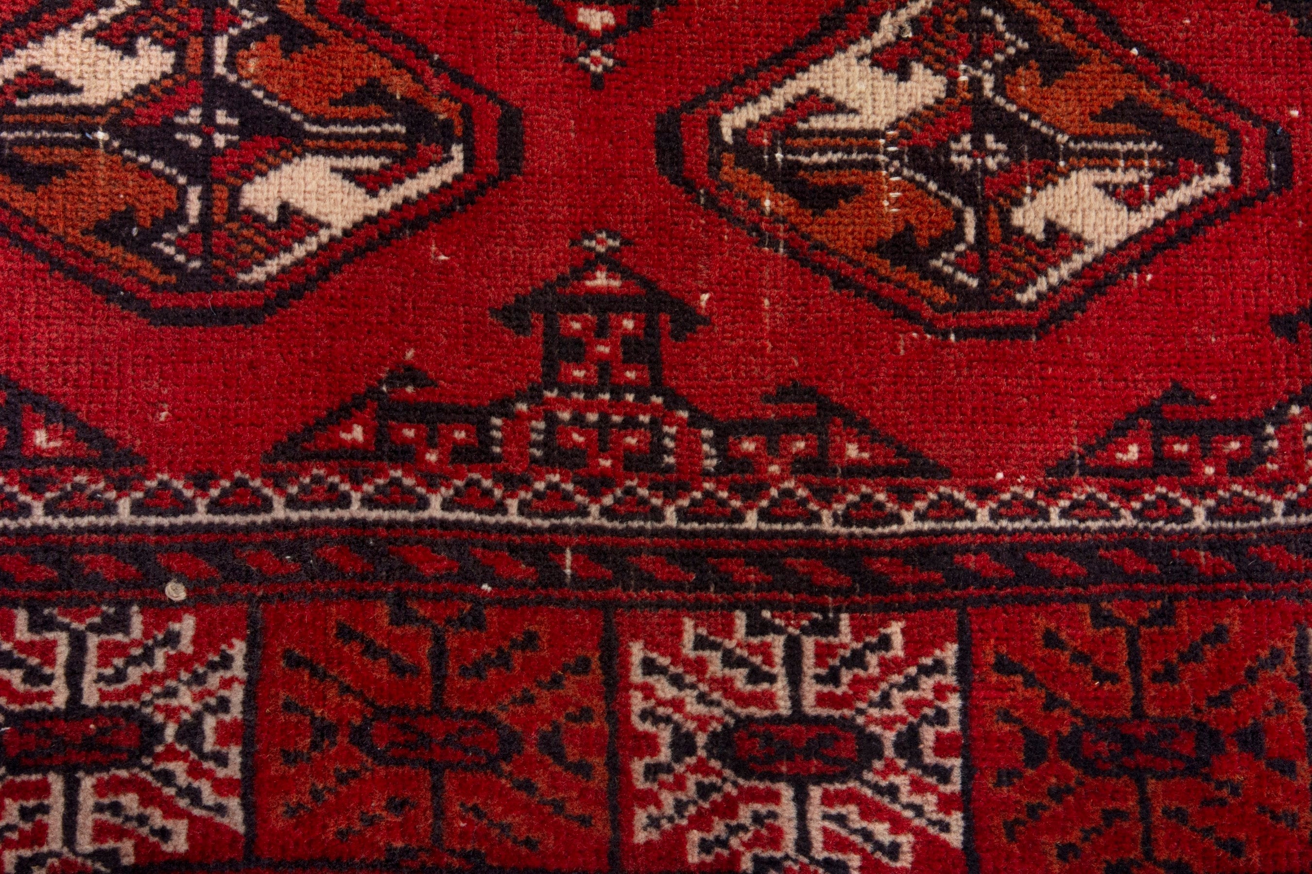Persian Torkaman accent rug in deep red and faded red, view 11 of 18