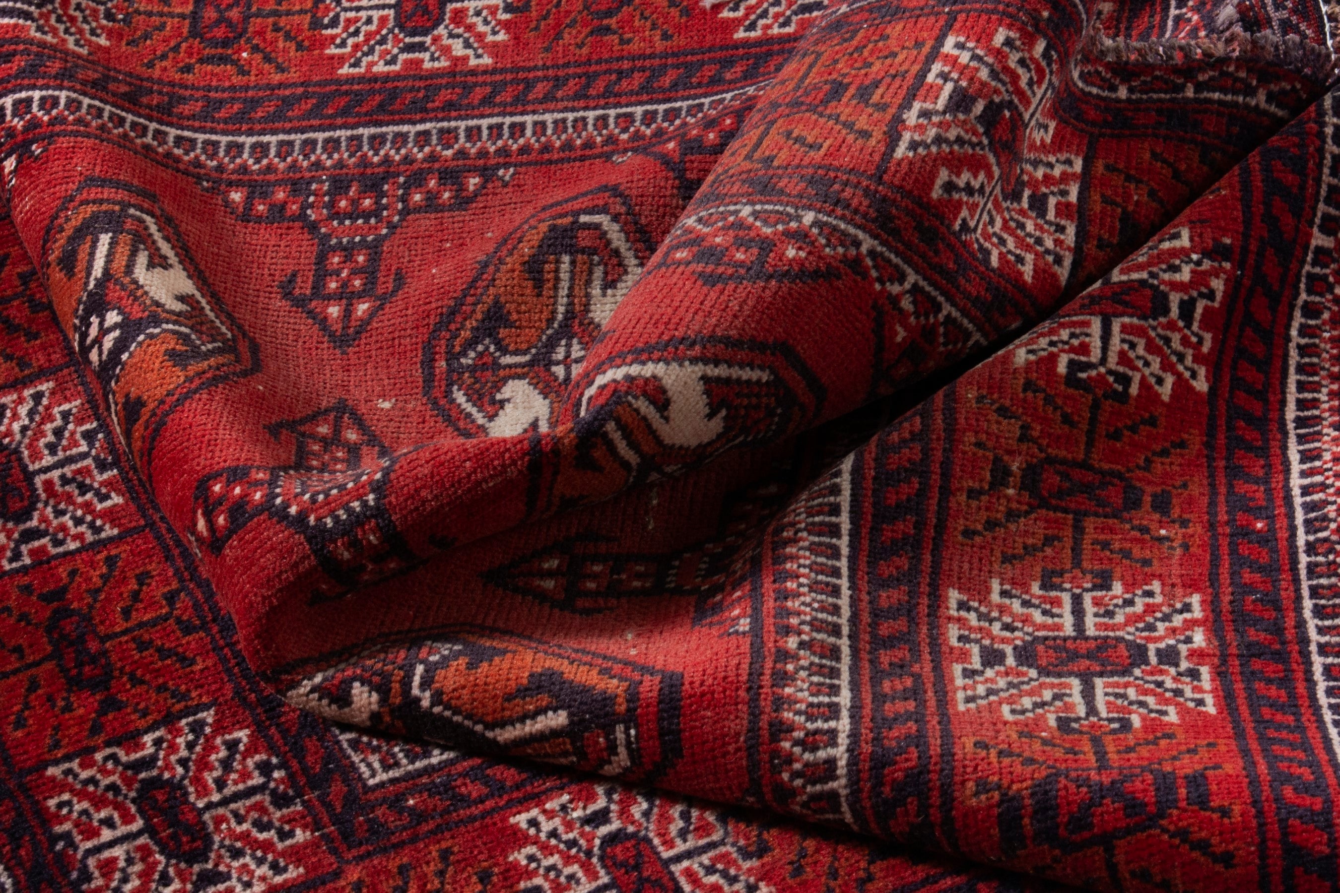 Persian Torkaman accent rug in deep red and faded red, view 15 of 18
