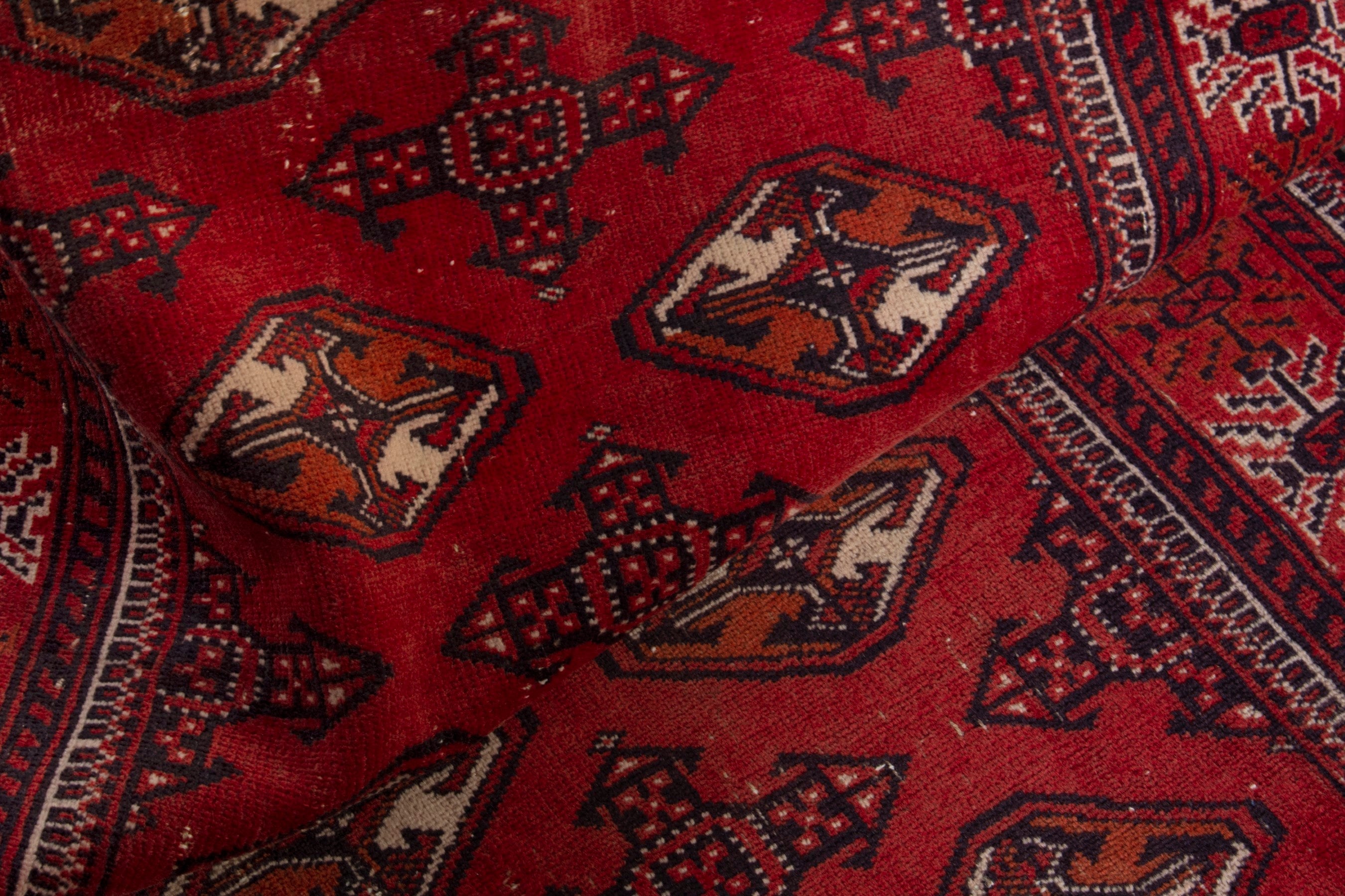 Persian Torkaman accent rug in deep red and faded red, view 17 of 18