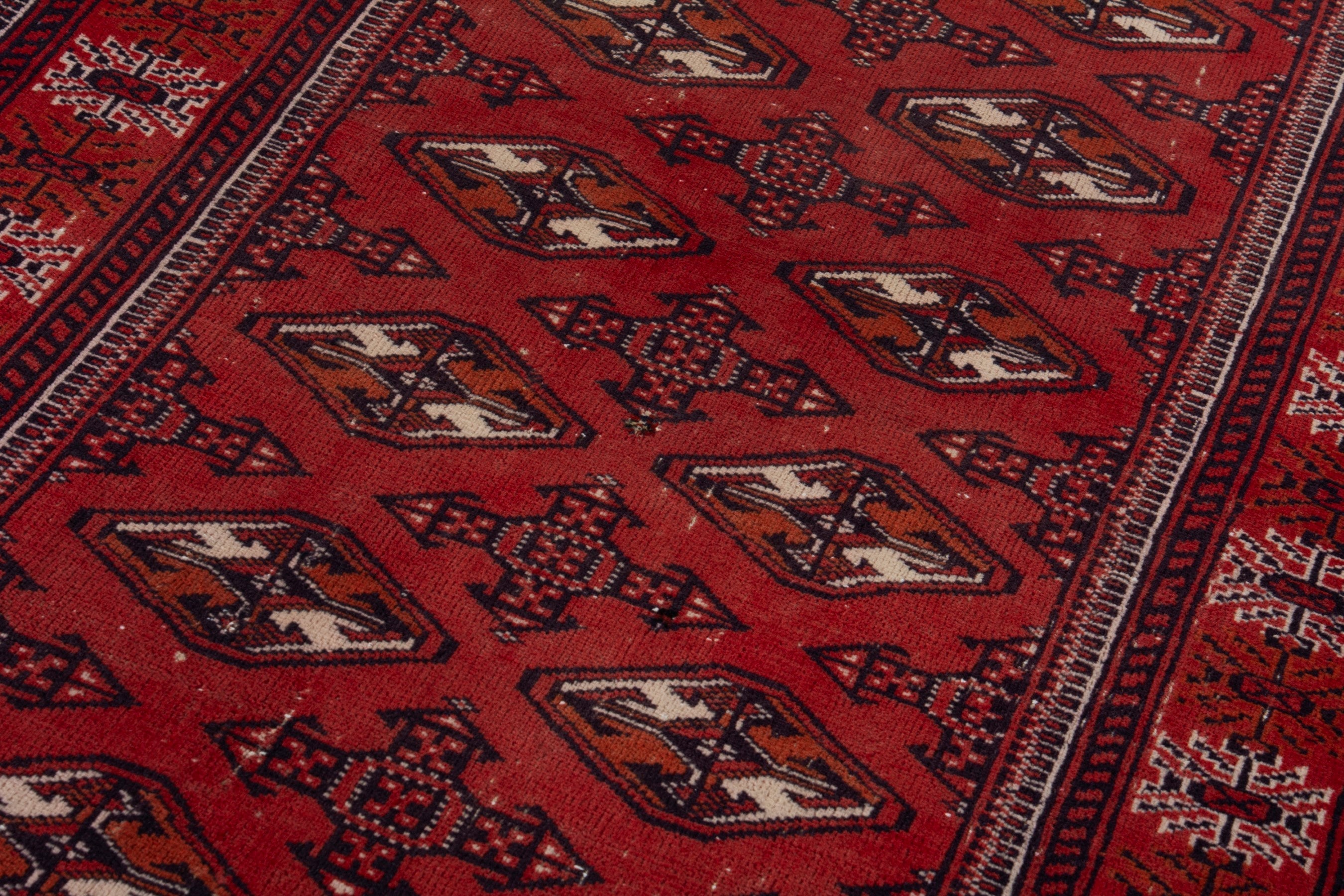 Persian Torkaman accent rug in deep red and faded red, view 9 of 18