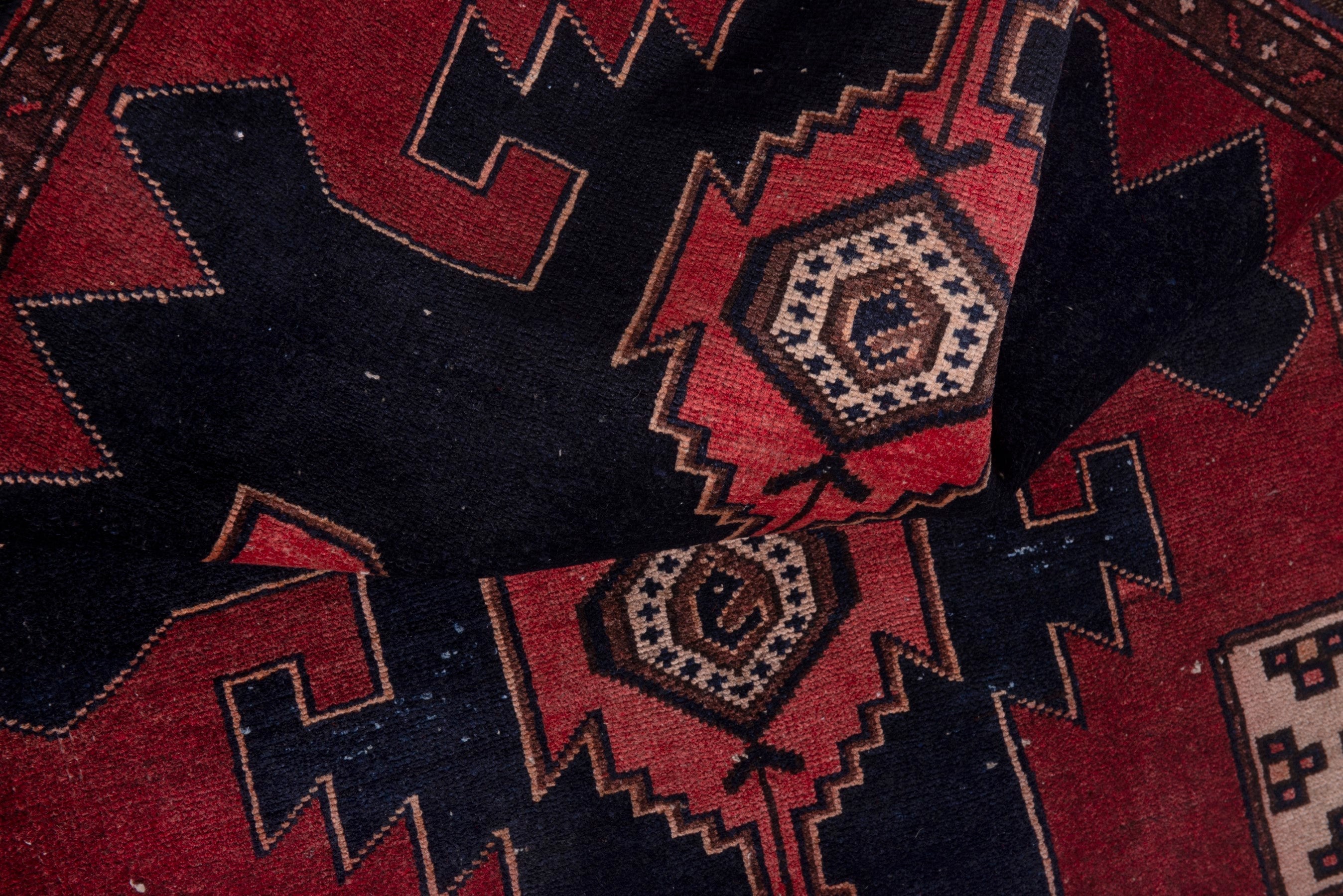 Persian Saveh accent rug in deep red and black, view 16 of 18