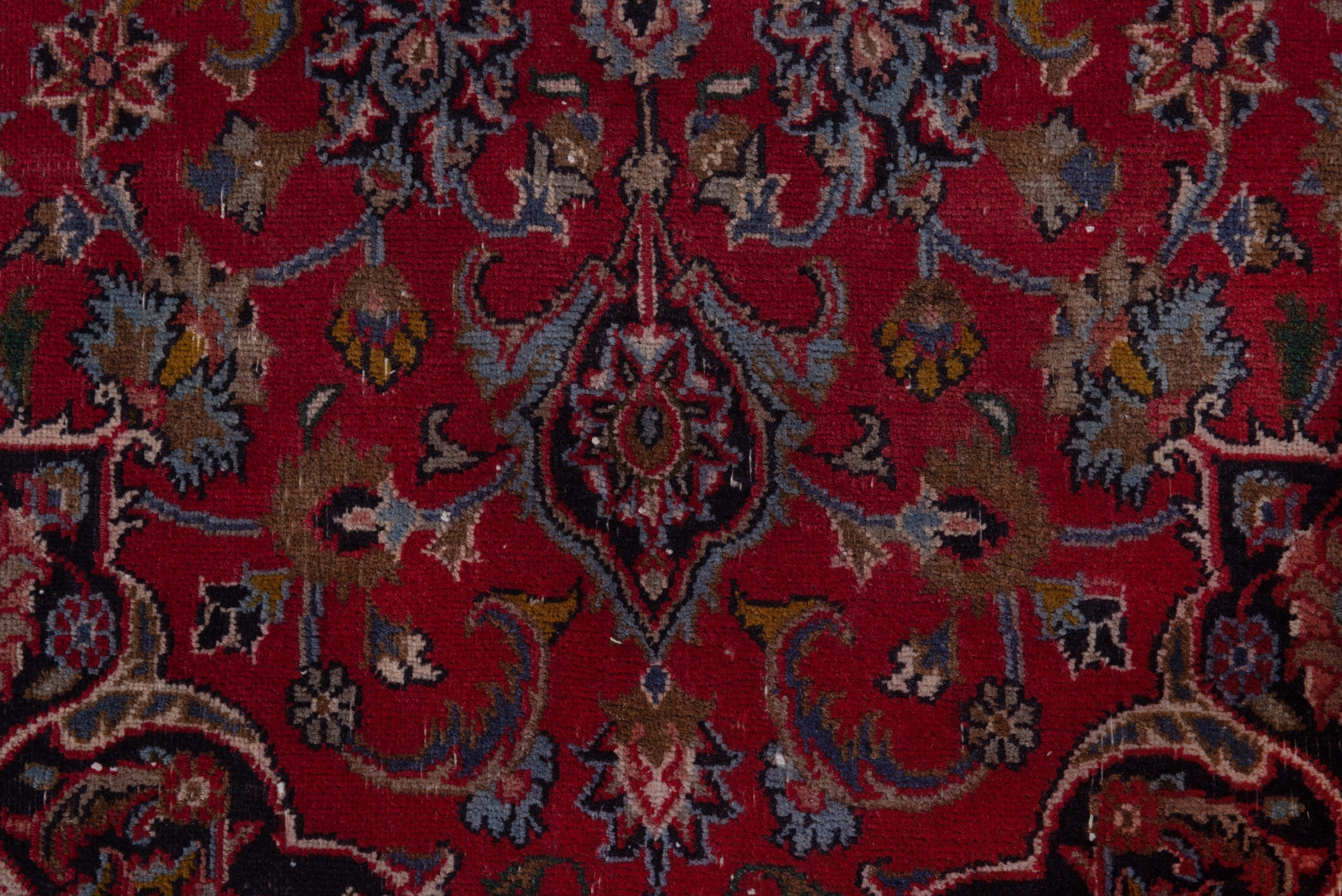 Persian Mashhad accent rug in deep red and faded red, view 12 of 19