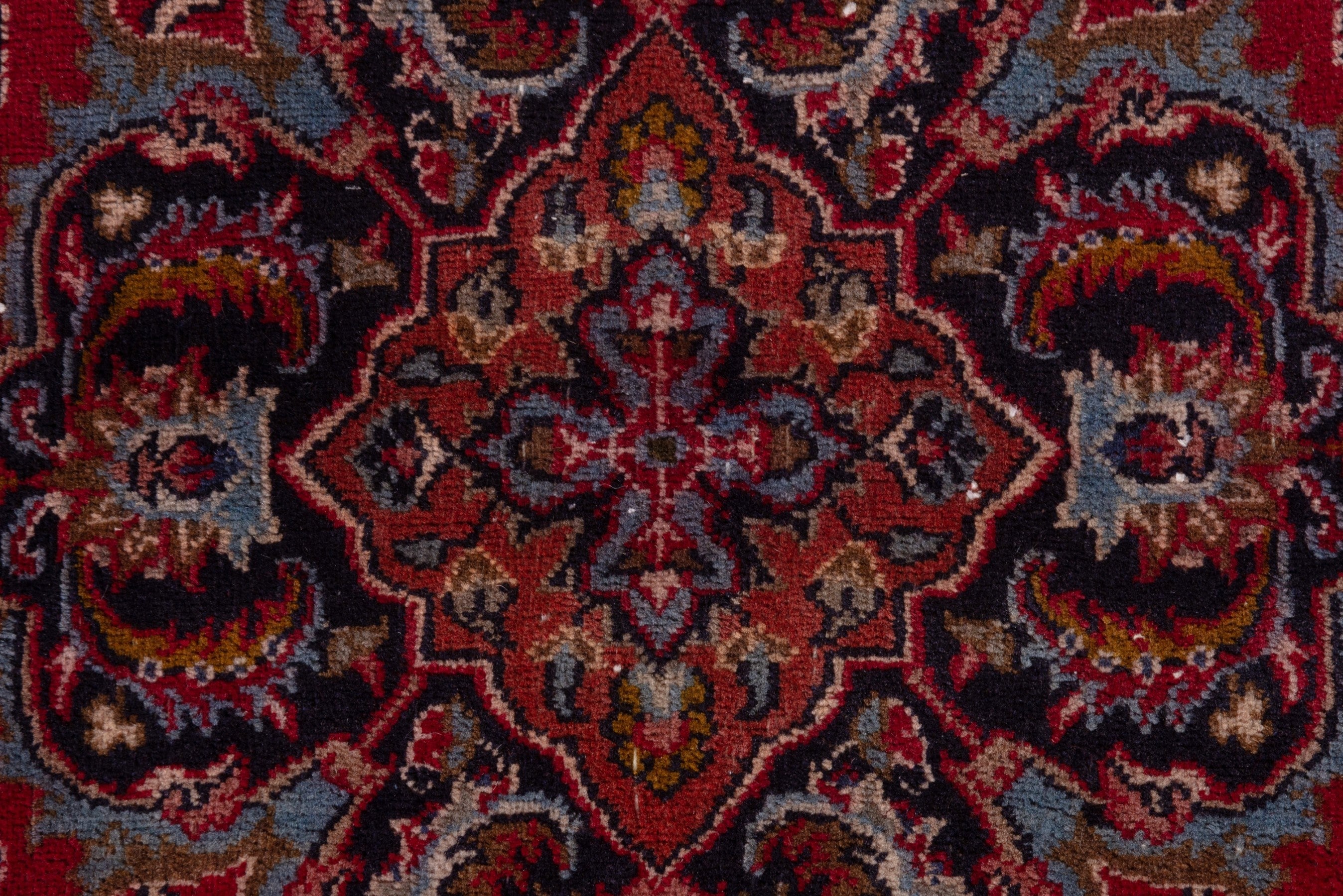 Persian Mashhad accent rug in deep red and faded red, view 13 of 19