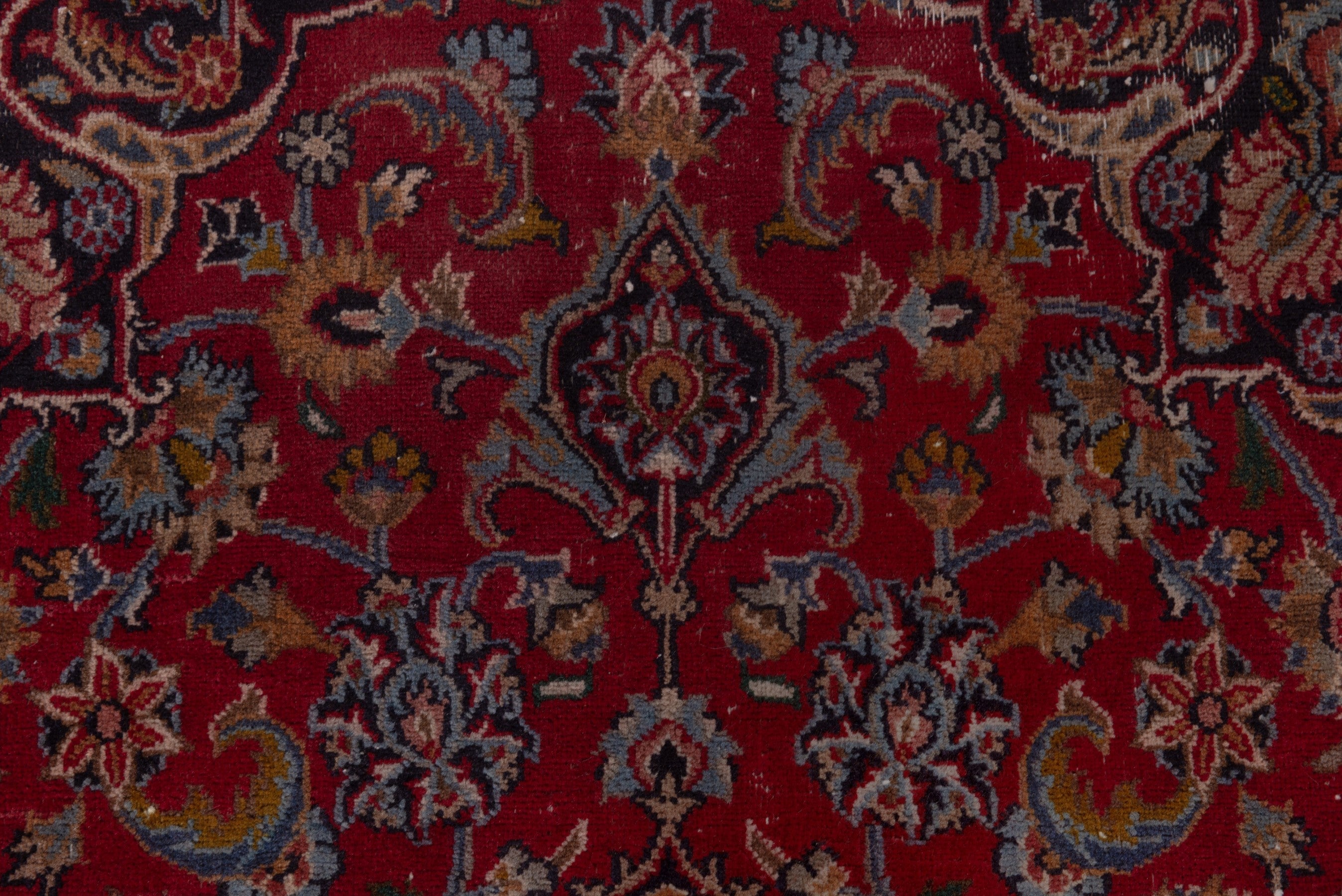 Persian Mashhad accent rug in deep red and faded red, view 14 of 19