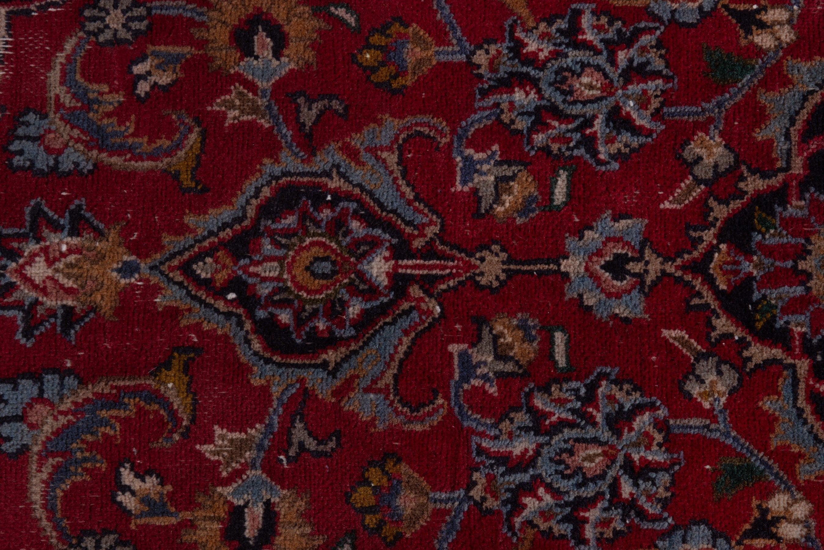 Persian Mashhad accent rug in deep red and faded red, view 15 of 19