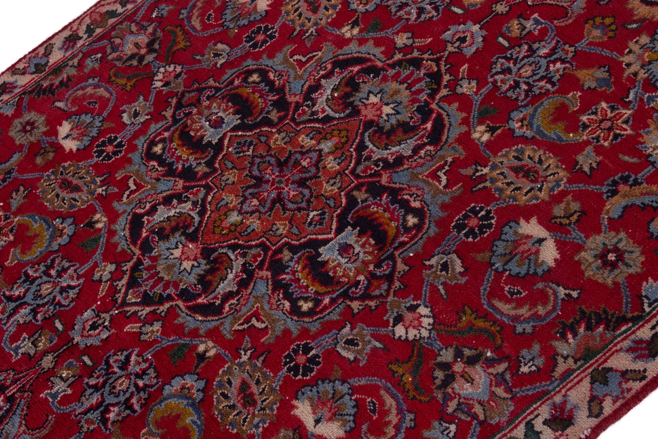 Persian Mashhad accent rug in deep red and faded red, view 4 of 19