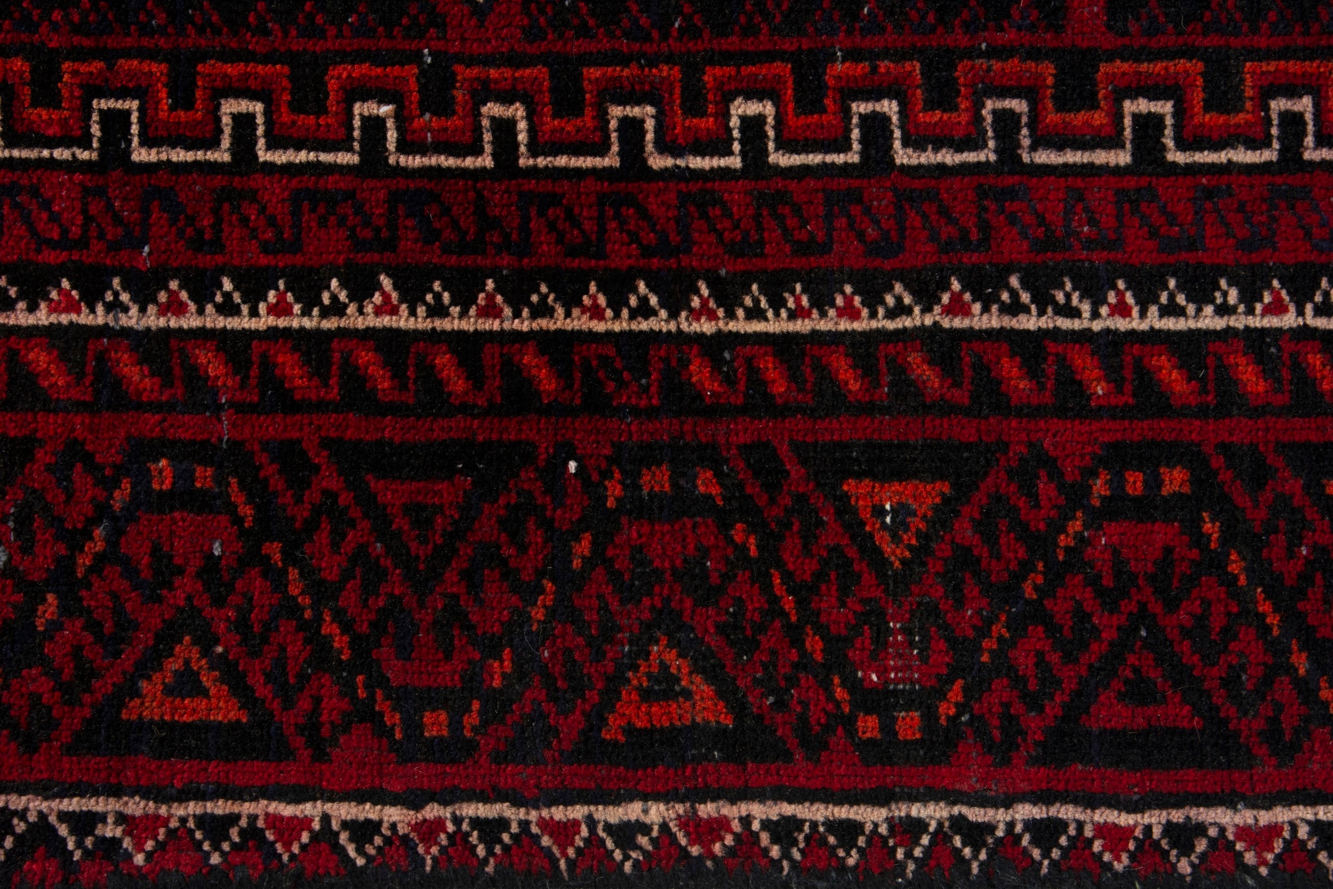 Persian Baluch accent rug in burgundy and deep red, view 13 of 17