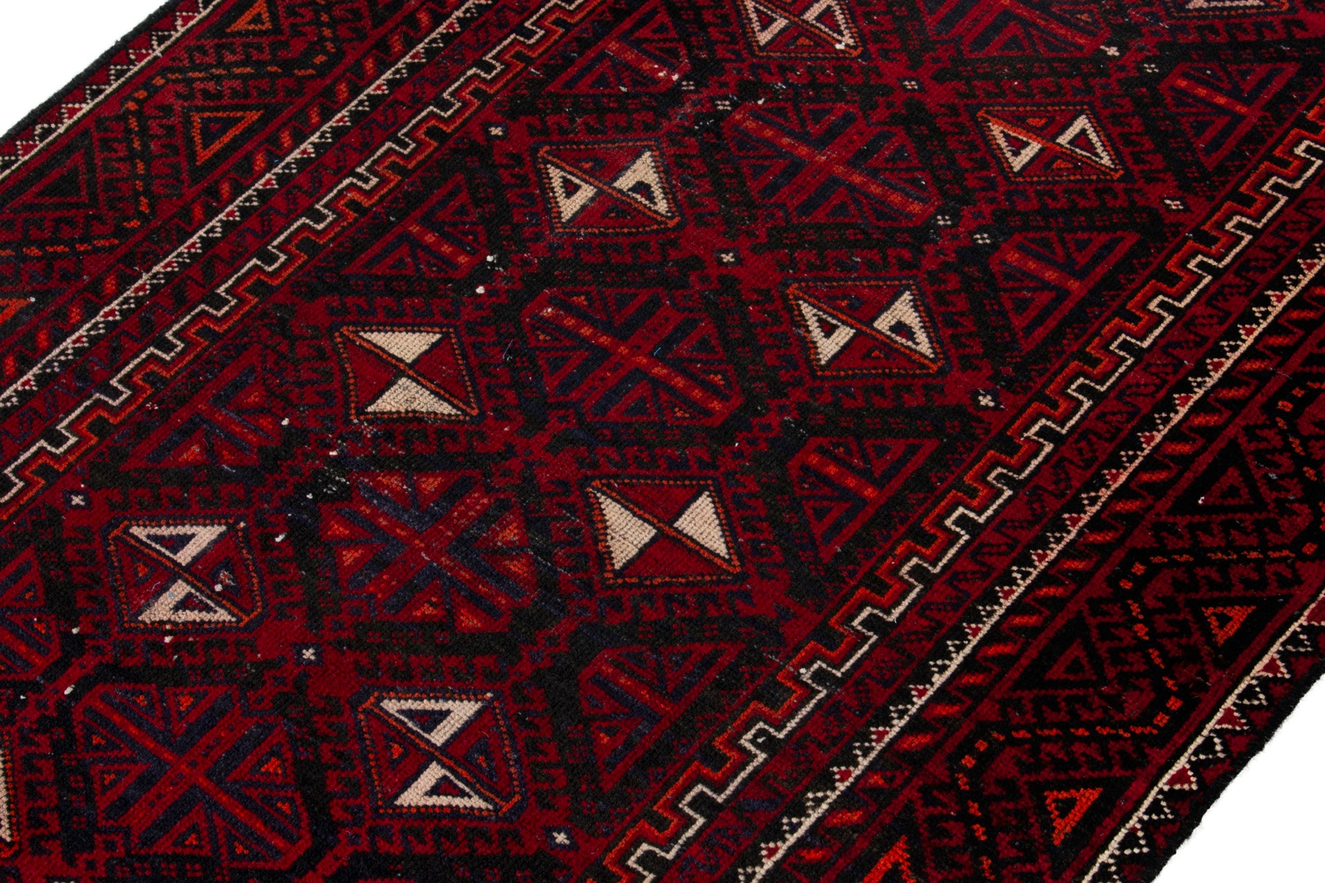 Persian Baluch accent rug in burgundy and deep red, view 4 of 17