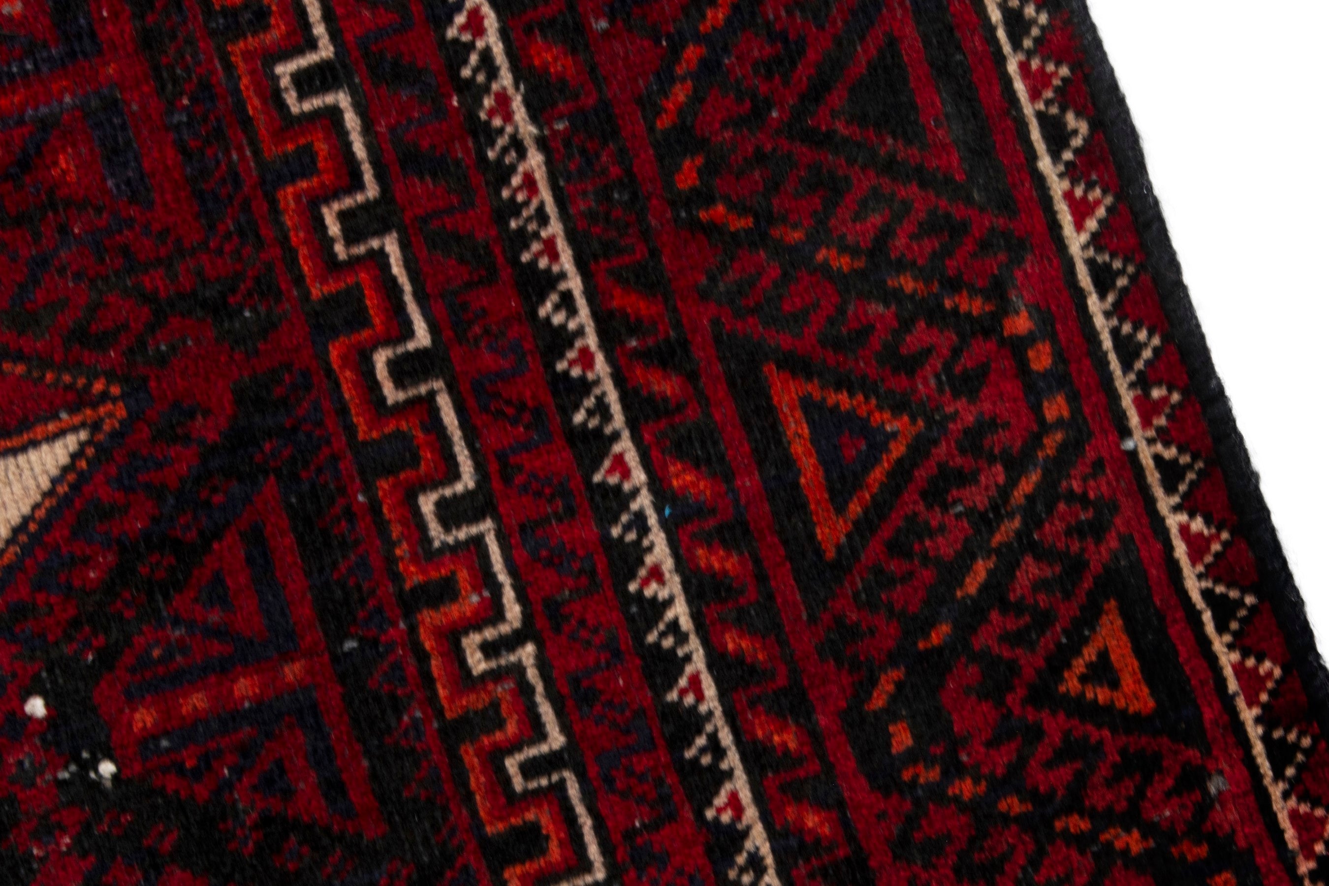 Persian Baluch accent rug in burgundy and deep red, view 7 of 17
