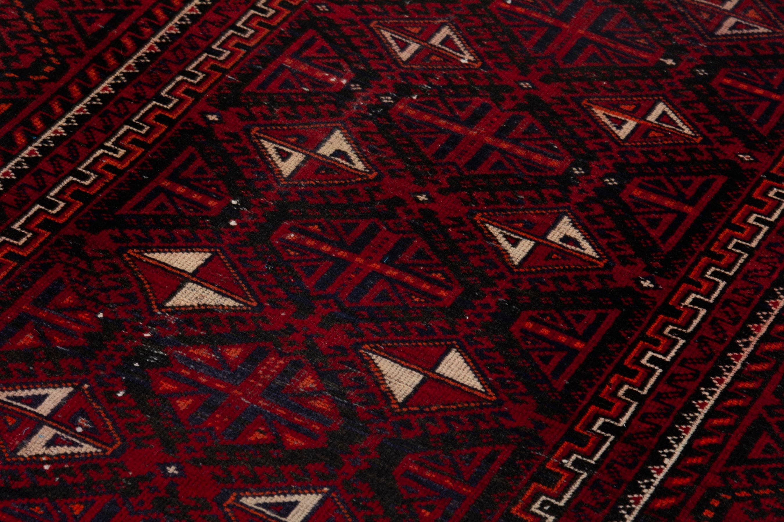 Persian Baluch accent rug in burgundy and deep red, view 9 of 17