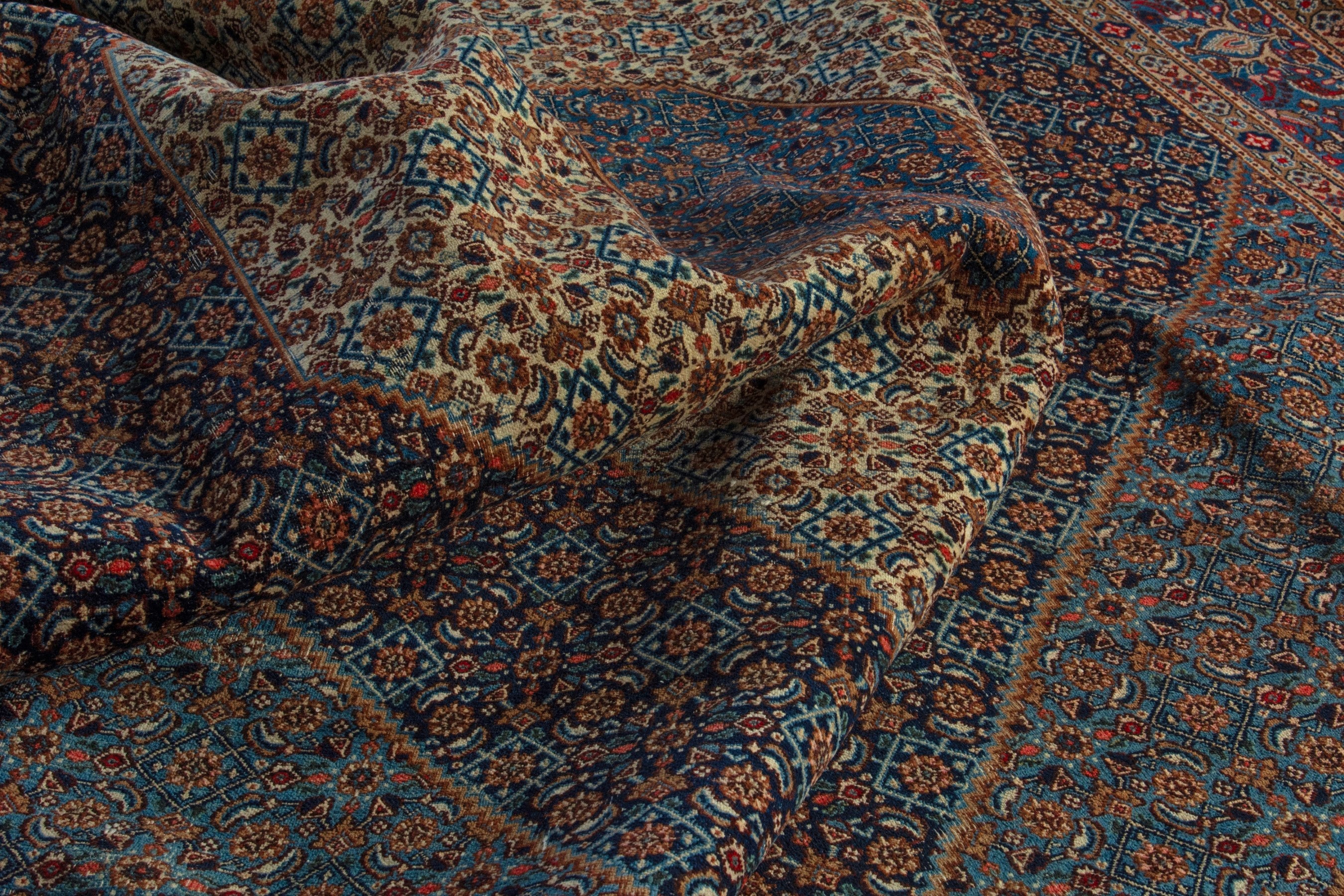 Persian Birjand oversized rug in dark blue and cream, view 15 of 21